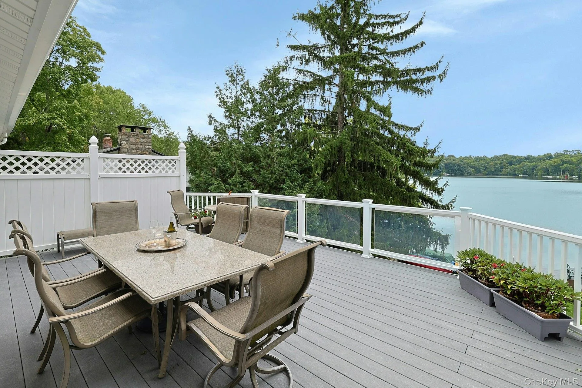 Breathtaking lake views all around—every angle offers a picture-perfect backdrop to enjoy the beauty of waterfront living Breathtaking lake views all around—every angle offers a picture-perfect backdrop to enjoy the beauty of waterfront living