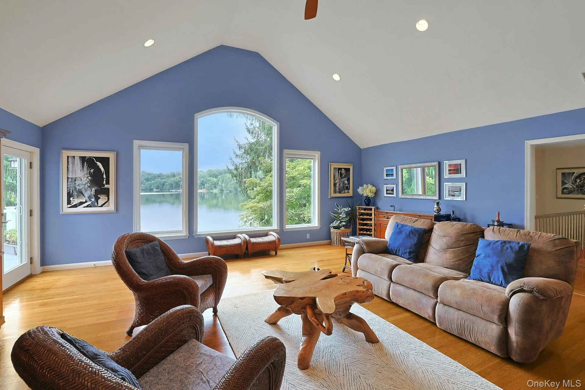 Beautiful lake views and a seamless connection to the outdoors through the French doors leading to the deck. Hear the water lapping against the shore, feel the breeze - from your own living room. Beautiful lake views and a seamless connection to the outdoors through the French doors leading to the deck. Hear the water lapping against the shore, feel the breeze - from your own living room.