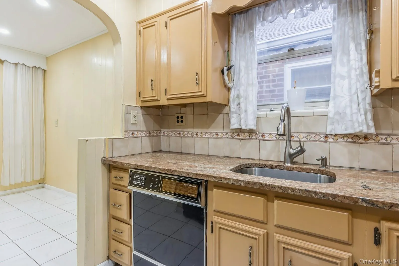 Kitchen featuring Granite Countertops Kitchen featuring Granite Countertops