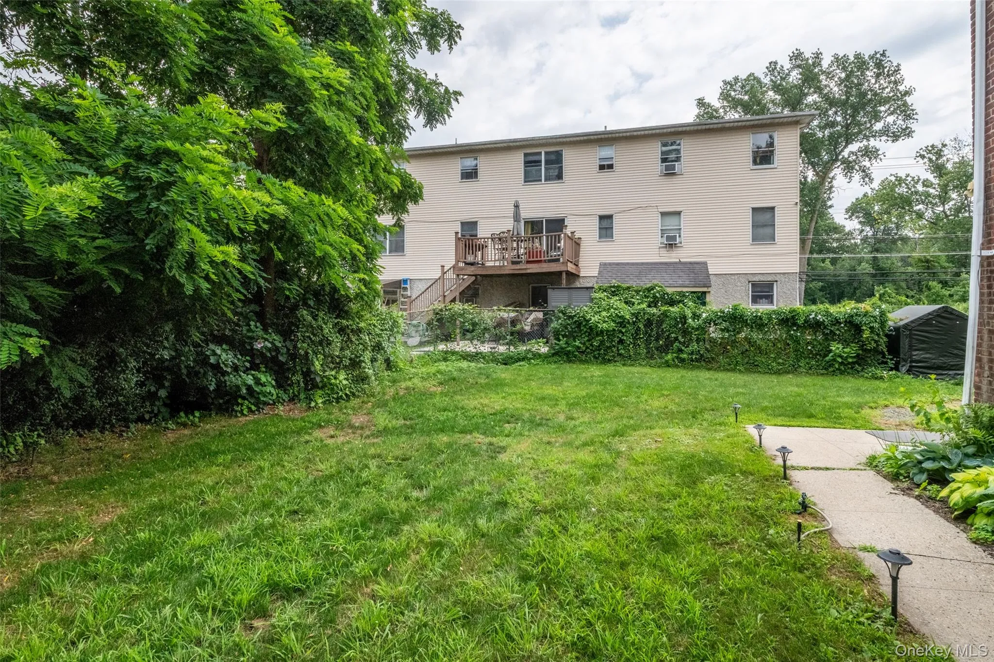 View of the back and side yard. View of the back and side yard.