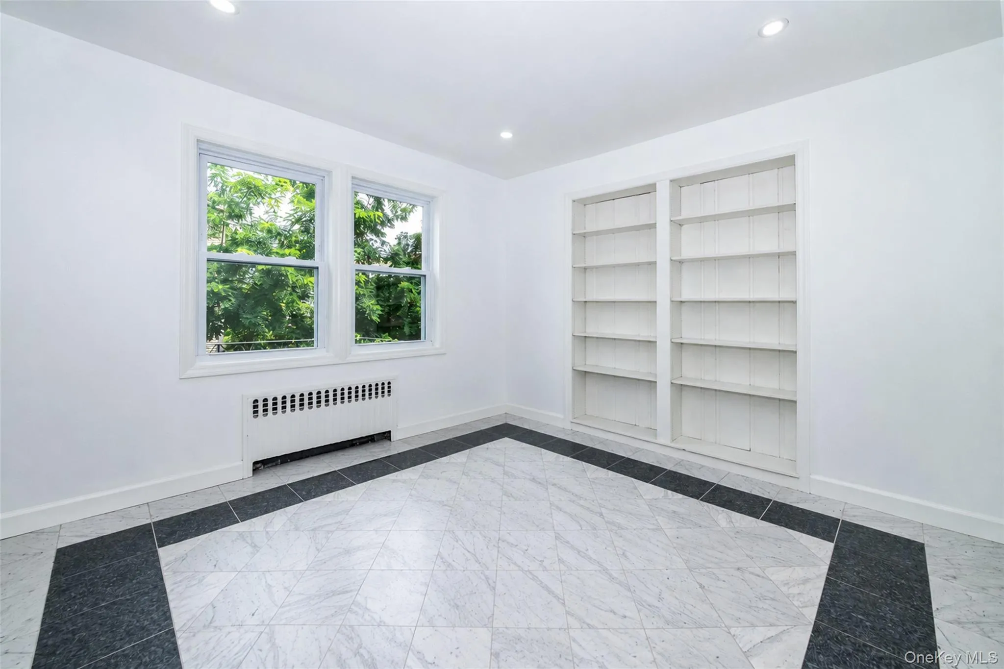 Second look at the den/office space with built-in cabinetry. Second look at the den/office space with built-in cabinetry.