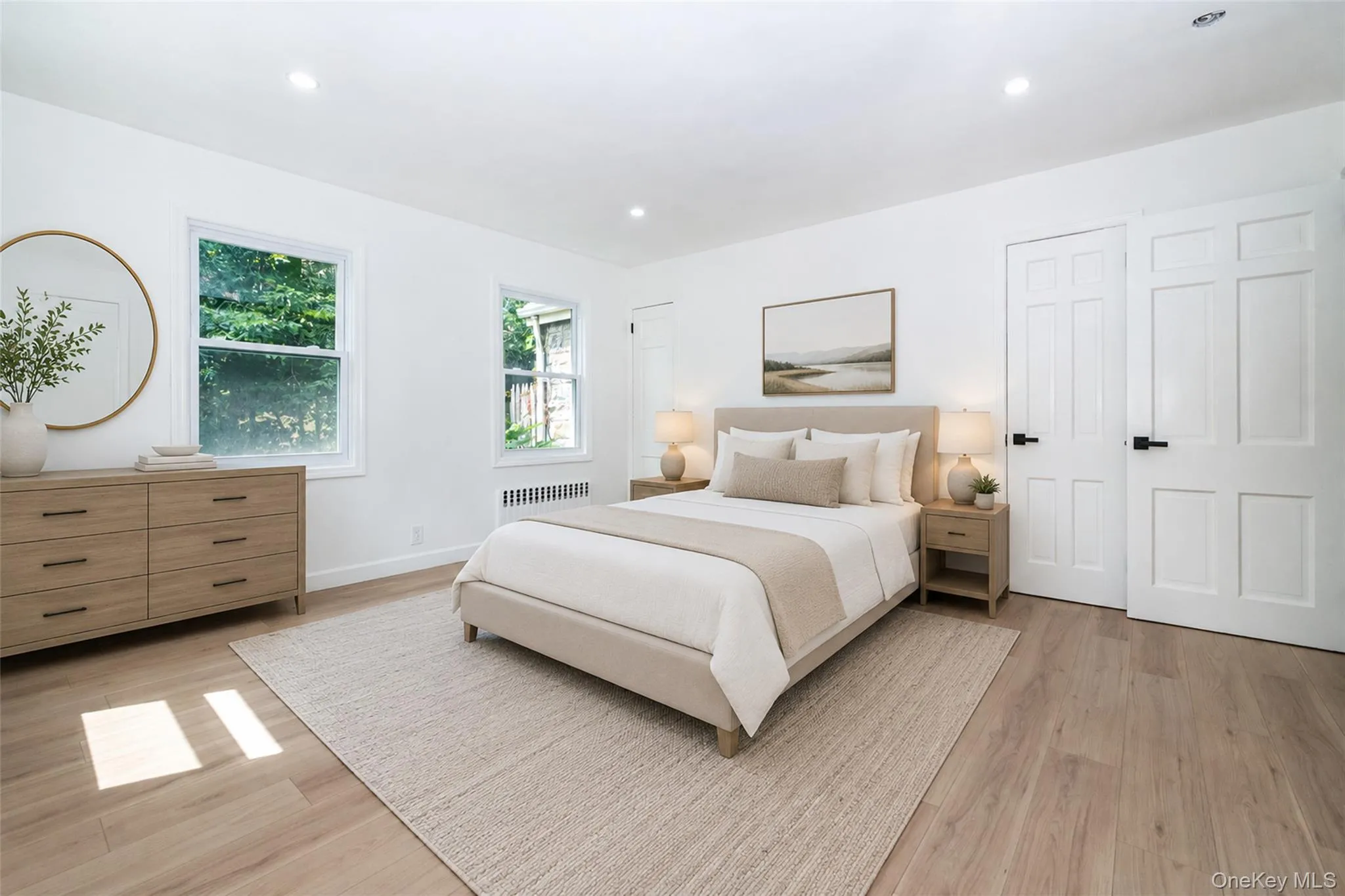 Virtually enhanced. The primary bedroom on the first floor has two closets and a bonus room. Virtually enhanced. The primary bedroom on the first floor has two closets and a bonus room.