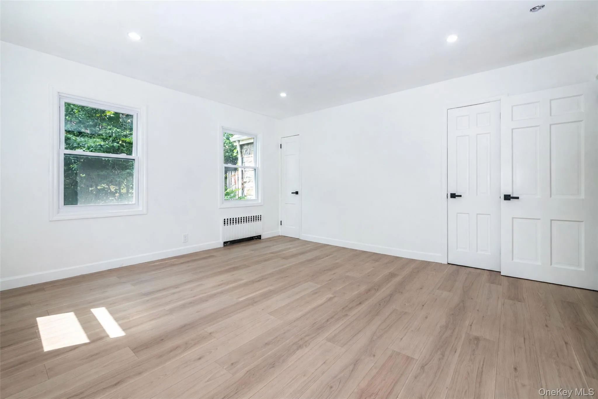 The primary bedroom on the first floor. The primary bedroom on the first floor.