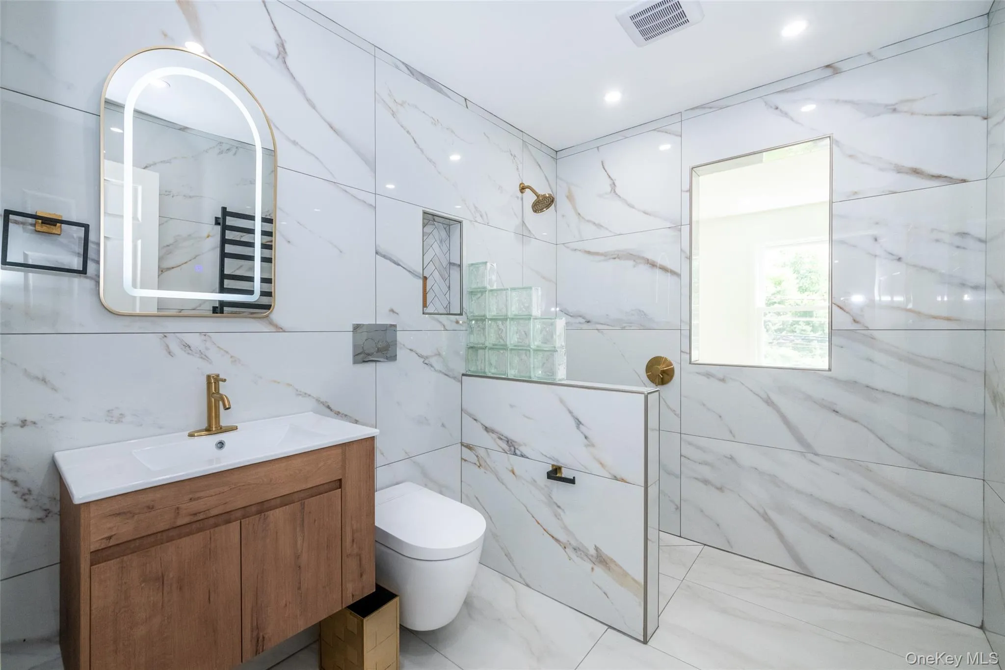 This is the SECOND full bathroom on the first floor and it's located near the bedrooms for privacy and convenience. This is the SECOND full bathroom on the first floor and it's located near the bedrooms for privacy and convenience.