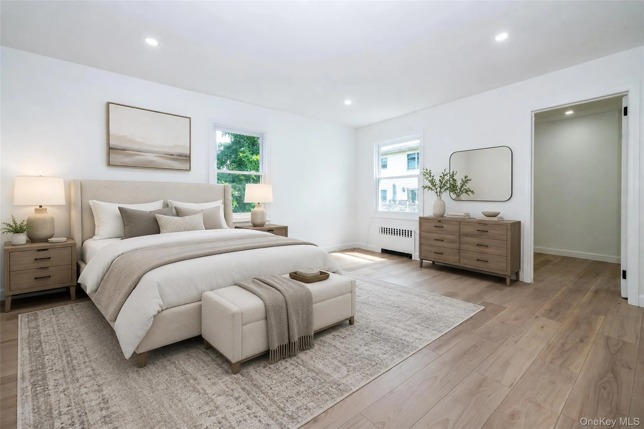 Virtually enhanced photo. The second, first floor bedroom with spacious walk-in closet. Virtually enhanced photo. The second, first floor bedroom with spacious walk-in closet.