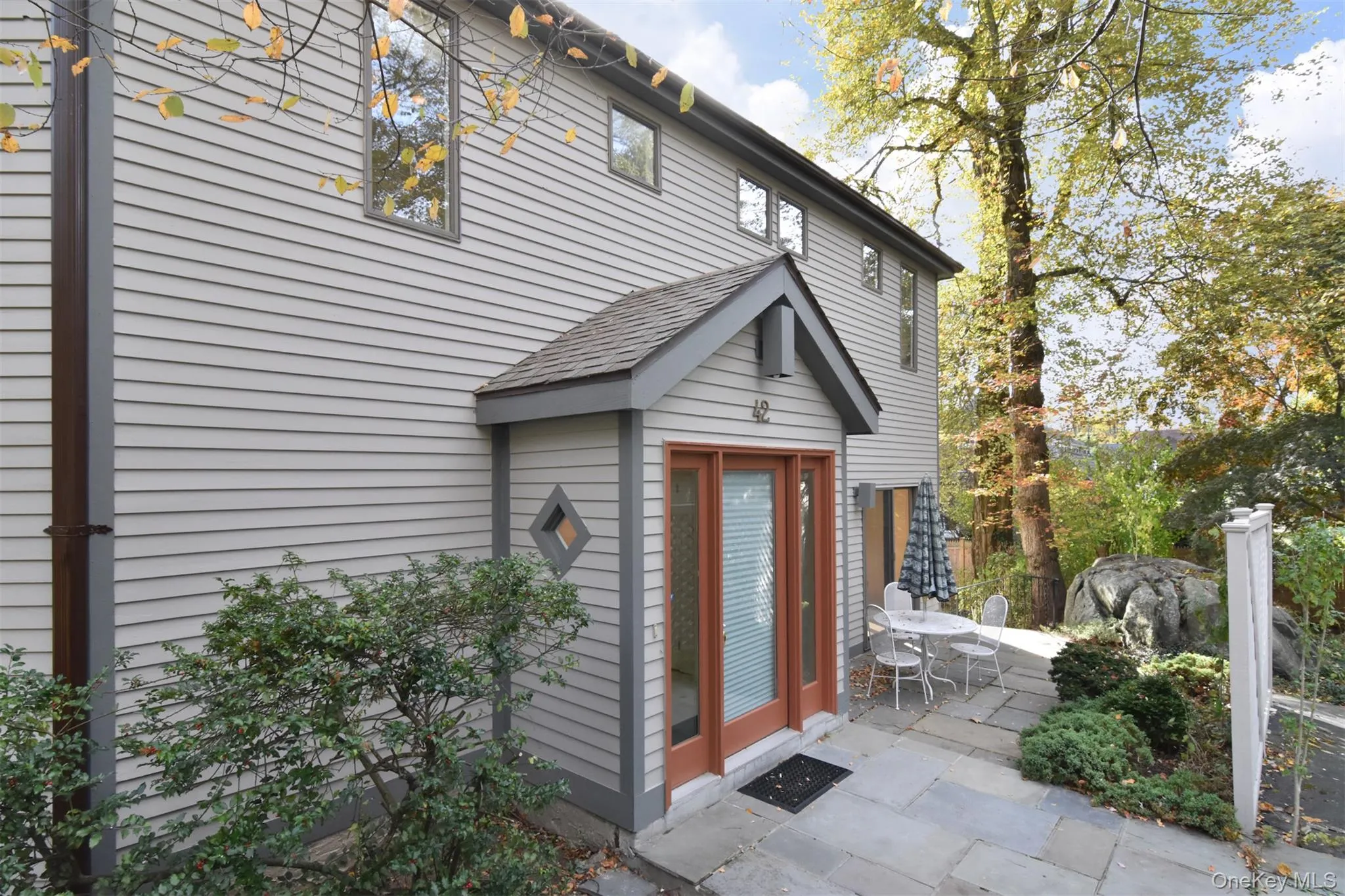 Entrance to property featuring a patio Entrance to property featuring a patio