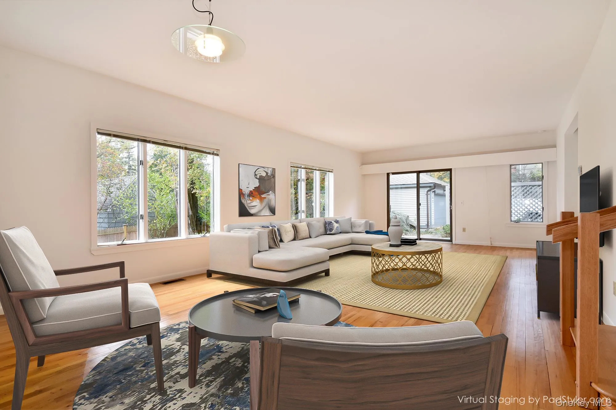 Virtually staged 30' Great Room featuring windows facing 3 directions Virtually staged 30' Great Room featuring windows facing 3 directions