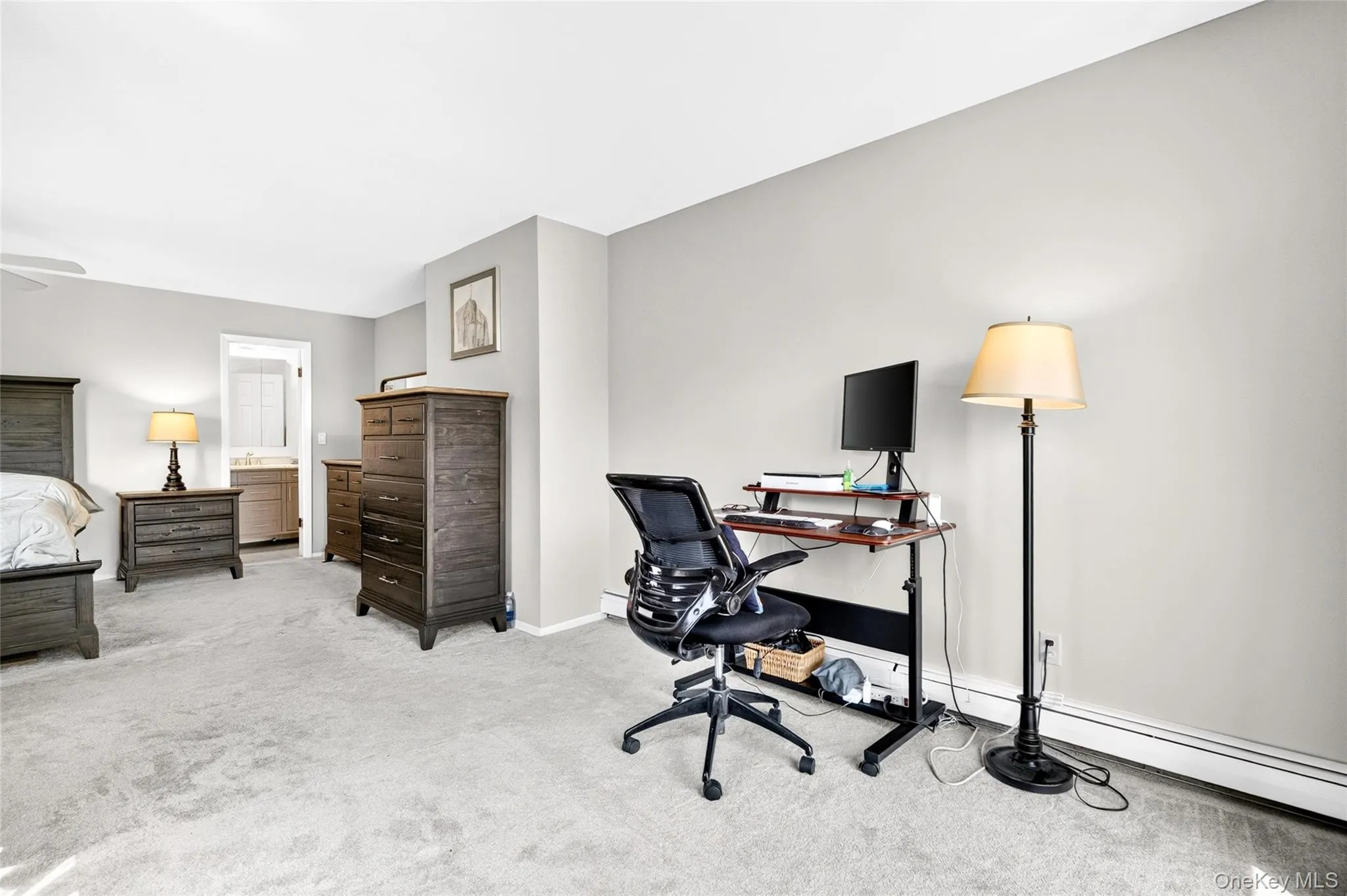 Carpeted room with light grey wall paint Carpeted room with light grey wall paint