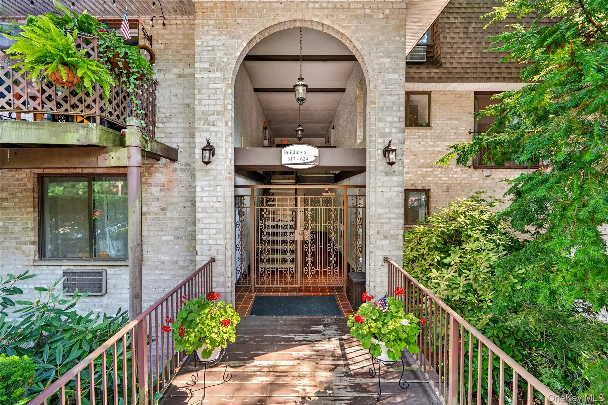 Brick facade entry featuring a prominent arched portico Brick facade entry featuring a prominent arched portico