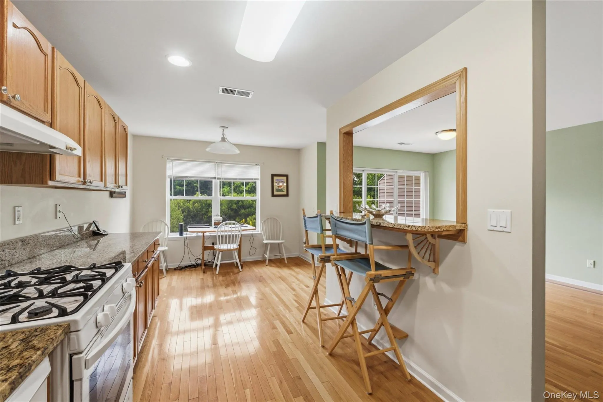 this kitchen has convenient break pass through to the dining area this kitchen has convenient break pass through to the dining area