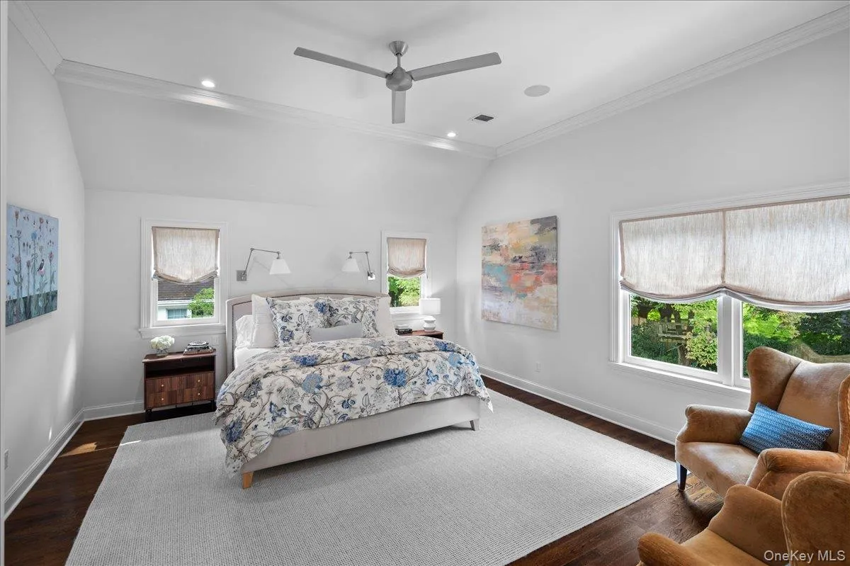 Large primary bedroom with vaulted ceiling. Large primary bedroom with vaulted ceiling.