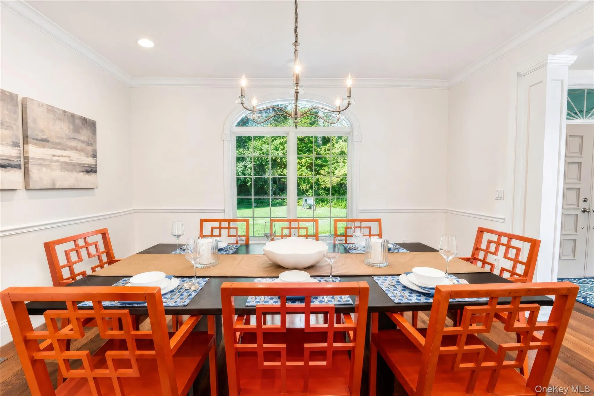A stunning perspective of this gracious dining room, designed for unforgettable dinners, celebrations, and cherished memories for years to come. A stunning perspective of this gracious dining room, designed for unforgettable dinners, celebrations, and cherished memories for years to come.