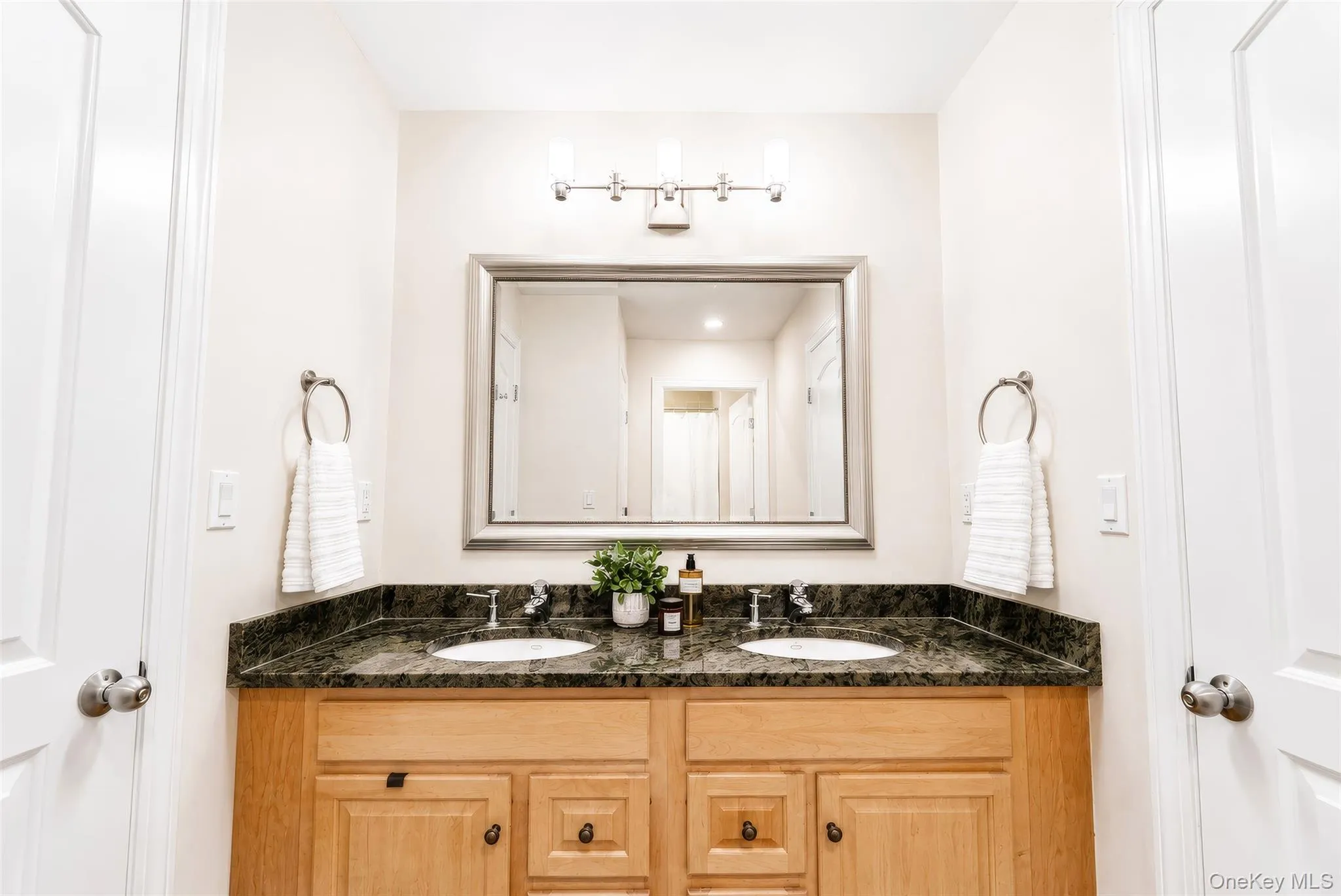 Jack and Jill full bath with tub, shower and double vanity is shared with bedrooms 2 & 3. Jack and Jill full bath with tub, shower and double vanity is shared with bedrooms 2 & 3.