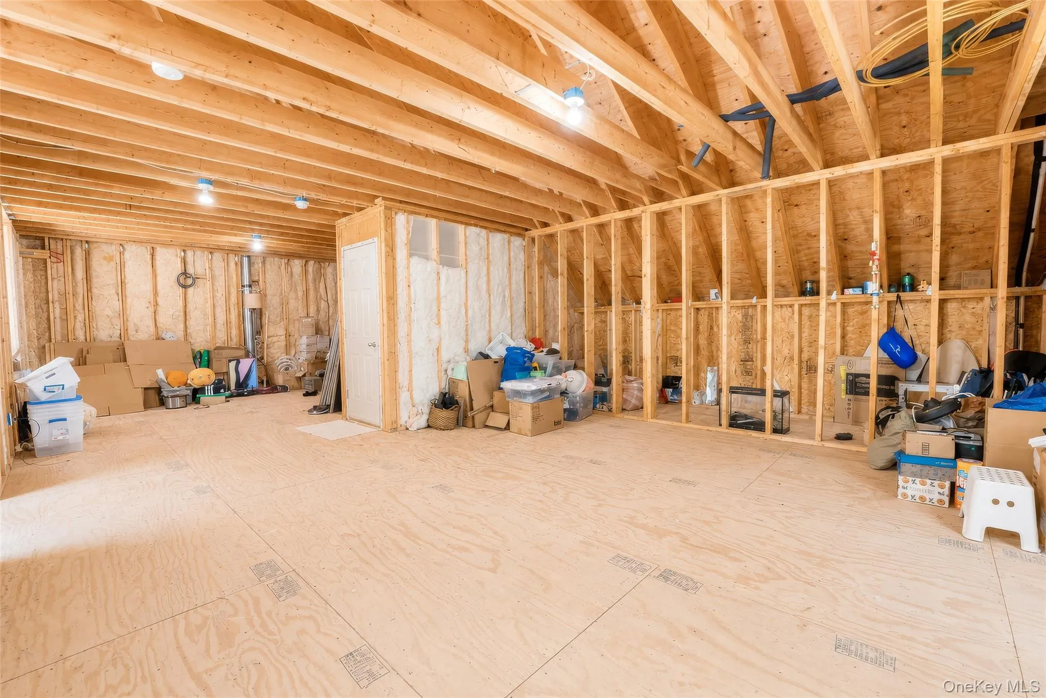 The expansive unfinished room over the garage offers over 800 square feet of unfinished space, providing an incredible opportunity to create a customized living area, office, home gym, or private retreat. The expansive unfinished room over the garage offers over 800 square feet of unfinished space, providing an incredible opportunity to create a customized living area, office, home gym, or private retreat.