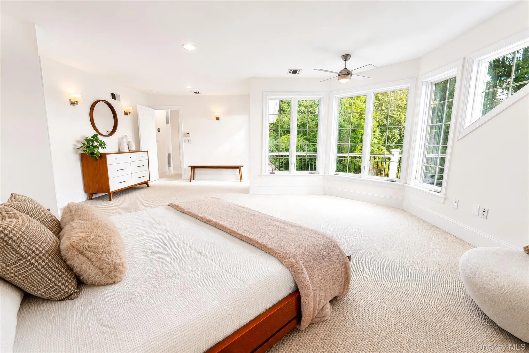 The primary suite is truly exceptional, featuring a luxurious en-suite bath, spacious walk-in closet, and a private deck offering a serene outdoor retreat. The primary suite is truly exceptional, featuring a luxurious en-suite bath, spacious walk-in closet, and a private deck offering a serene outdoor retreat.