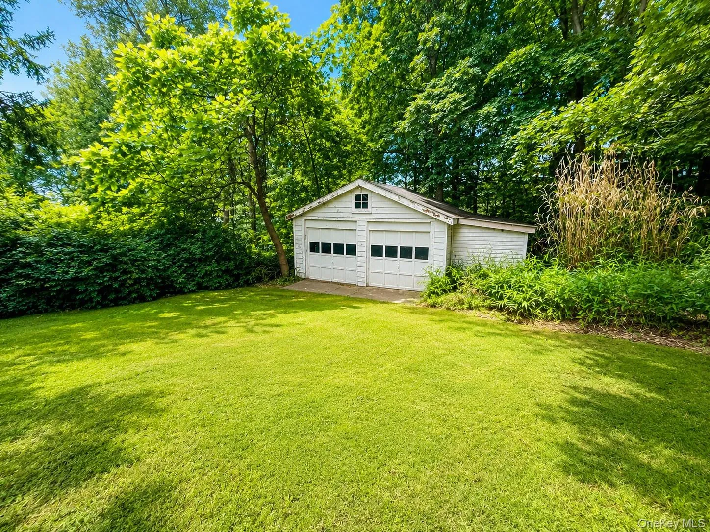 Detached 2 car garage and bonus storage room. Detached 2 car garage and bonus storage room.