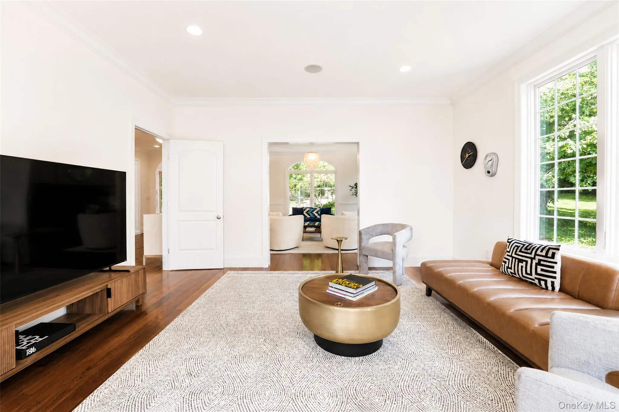 Drenched in natural light and enhanced by recessed lighting, this exceptional space offers far more than a gathering place—it is a true destination for relaxation and connection. Drenched in natural light and enhanced by recessed lighting, this exceptional space offers far more than a gathering place—it is a true destination for relaxation and connection.