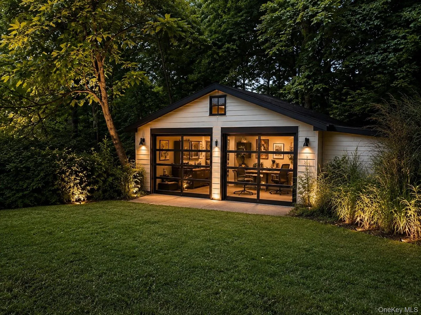 Digitally staged detached 2-car garage showcasing its incredible potential. The possibilities are endless to create a workshop, home gym, studio, extra storage, or the space you've always envisioned! Digitally staged detached 2-car garage showcasing its incredible potential. The possibilities are endless to create a workshop, home gym, studio, extra storage, or the space you've always envisioned!
