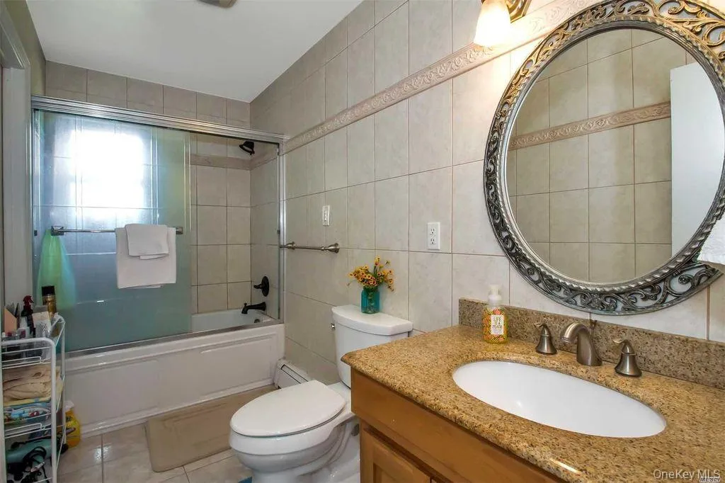 Hall Bathroom (dual entry from primary and hallway) Hall Bathroom (dual entry from primary and hallway)