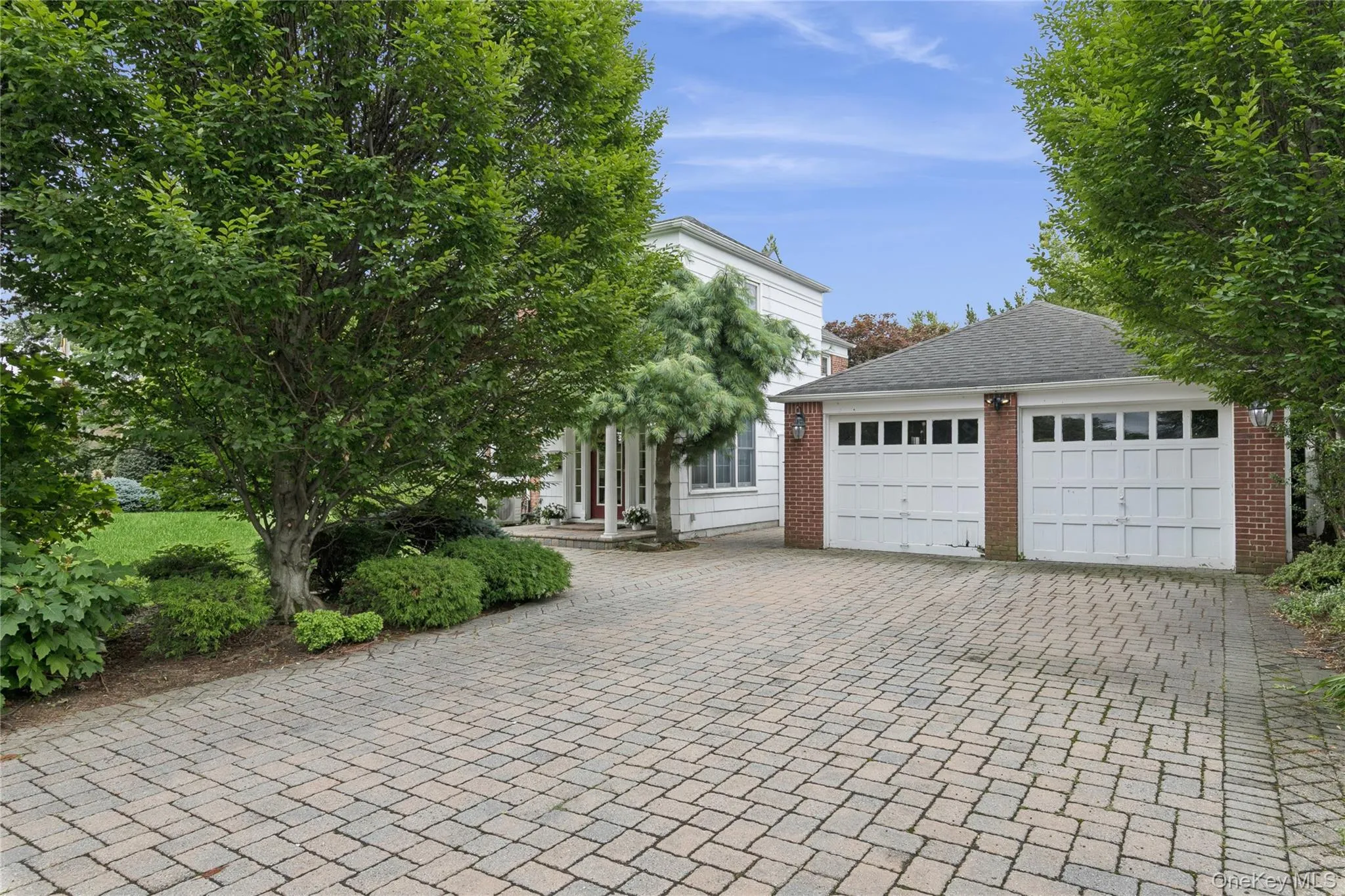 Beautiful double wide paver driveway accessed from Plumtree Lane Beautiful double wide paver driveway accessed from Plumtree Lane