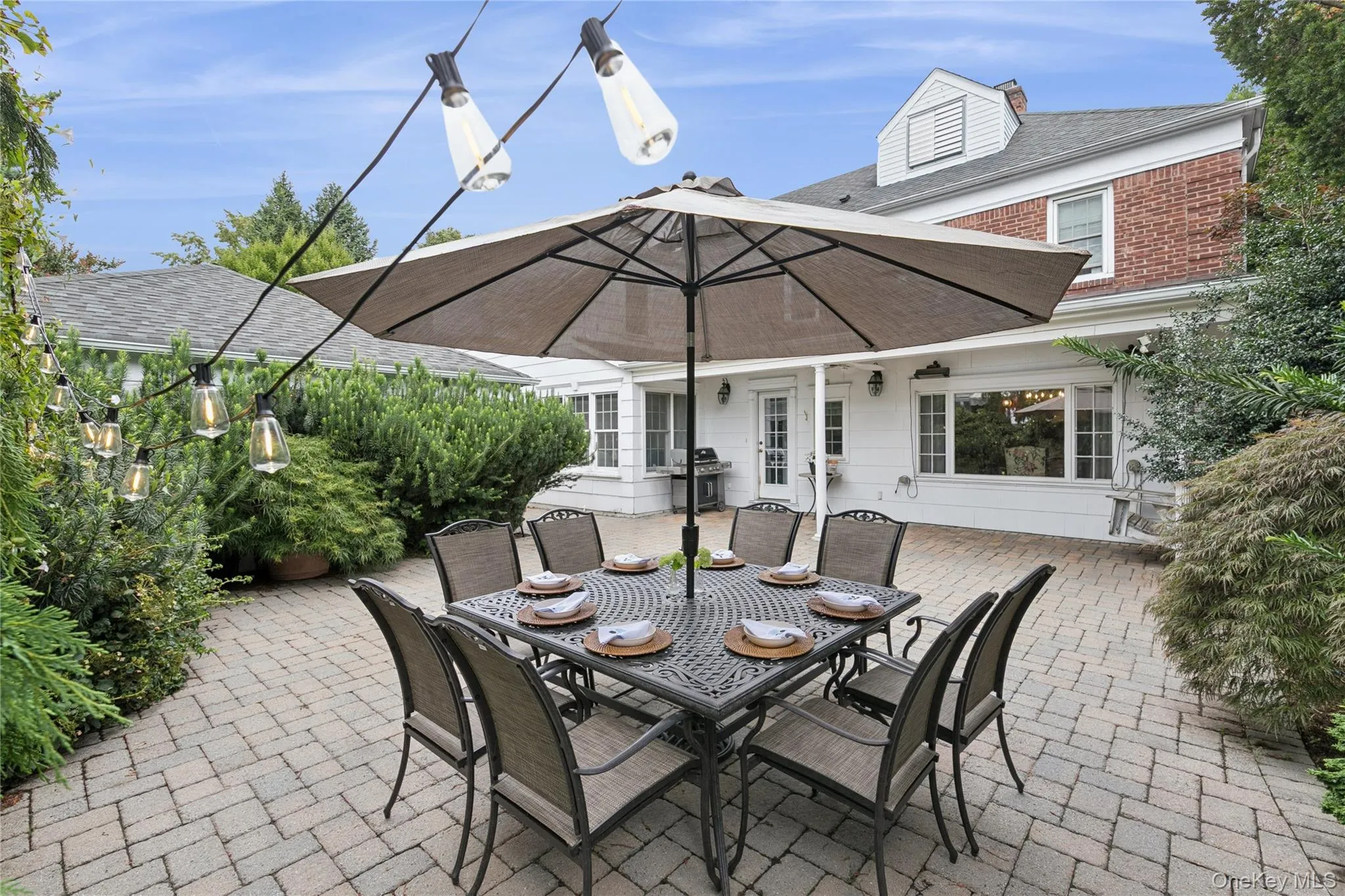 Huge back patio is perfect for alfresco dining Huge back patio is perfect for alfresco dining