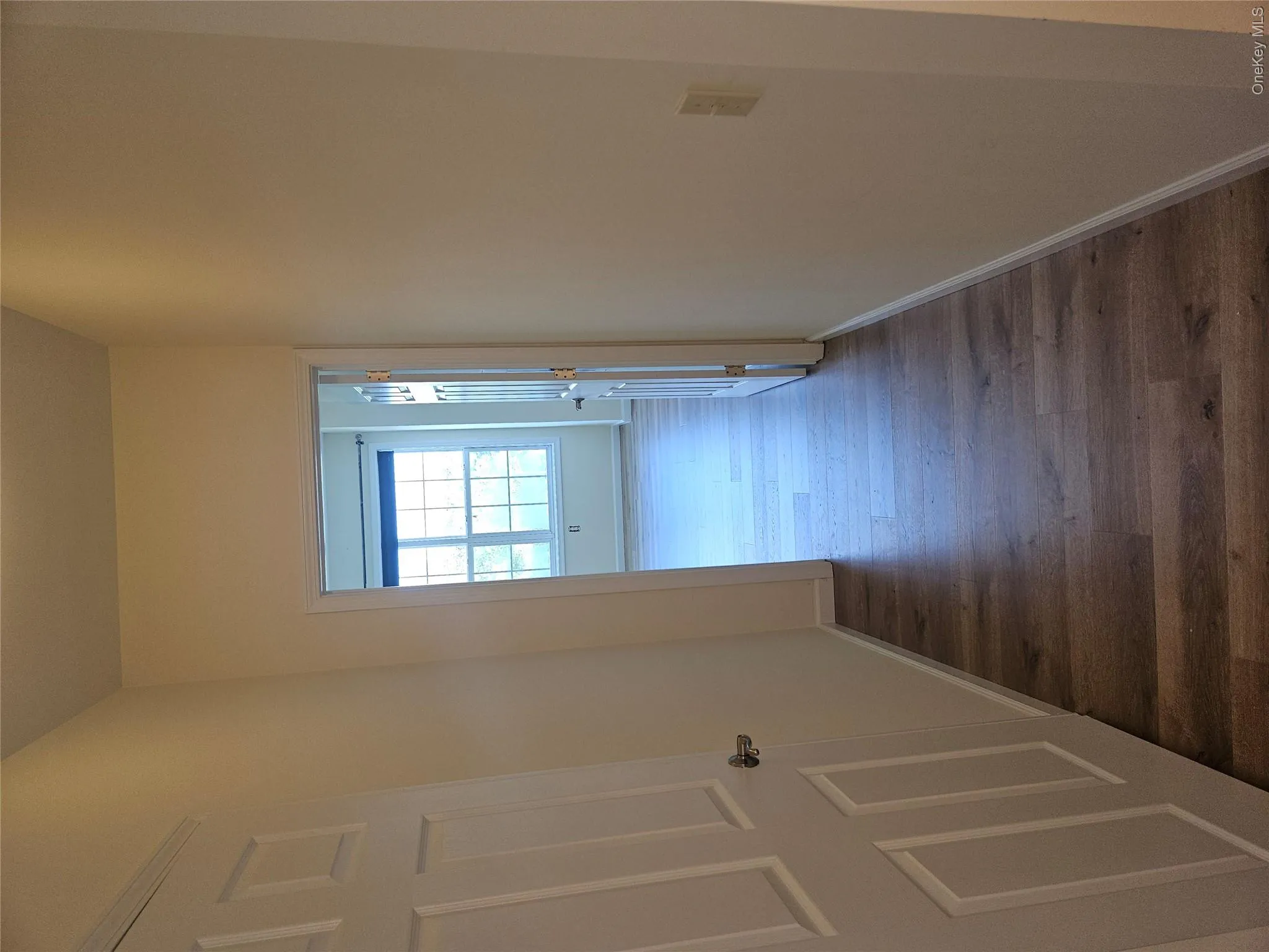 Looking from the dining area toward second bedroom. Door to second bathroom is on the left. Looking from the dining area toward second bedroom. Door to second bathroom is on the left.