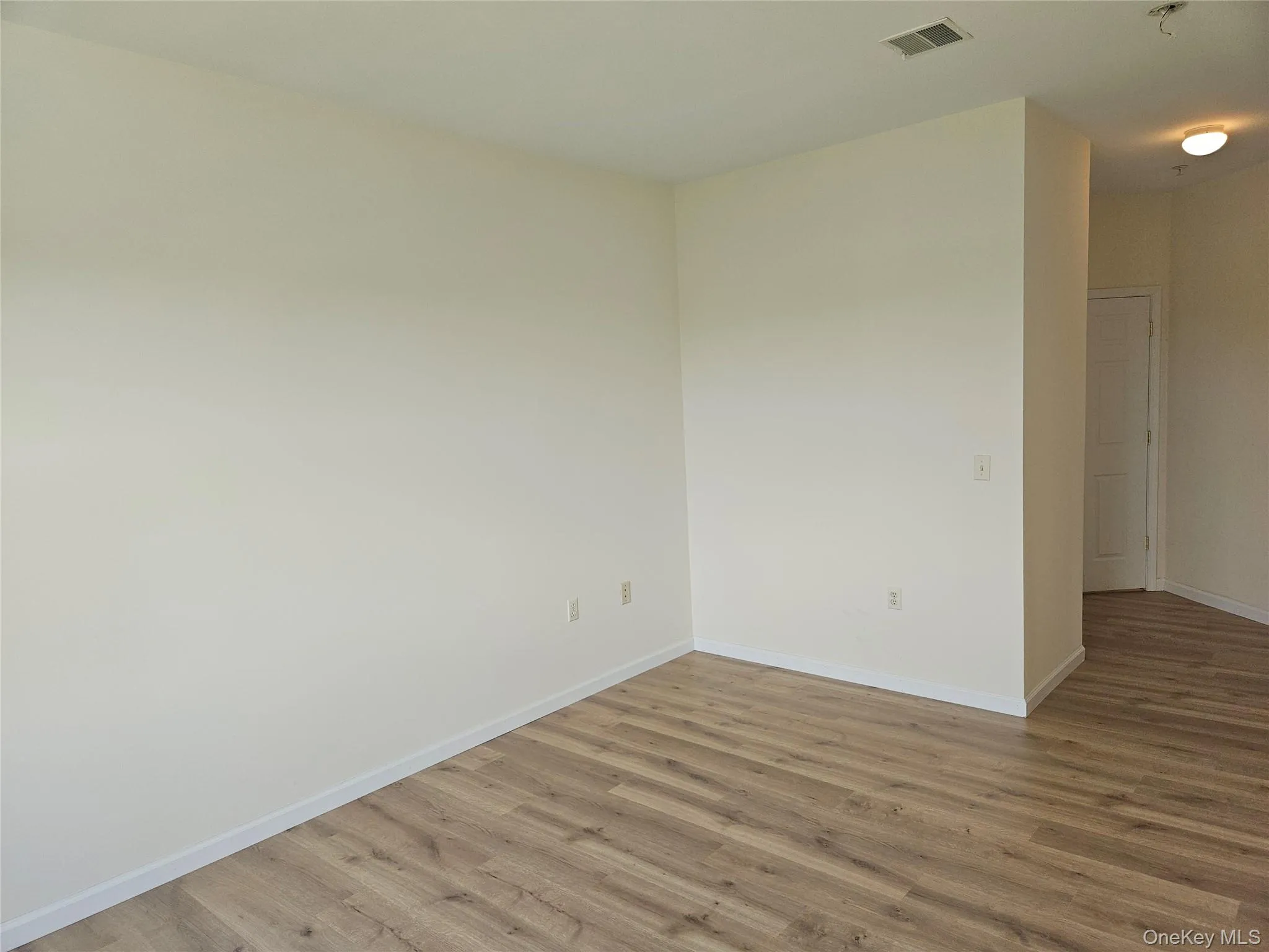 Looking toward the door to the primary bathroom. Looking toward the door to the primary bathroom.