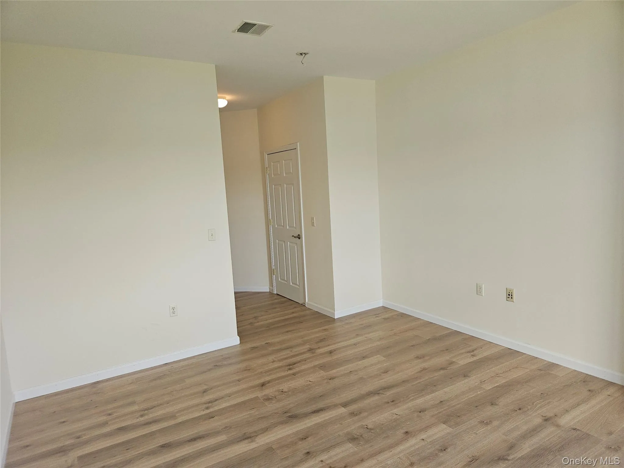 Looking toward door to the living room and living spaces. Looking toward door to the living room and living spaces.