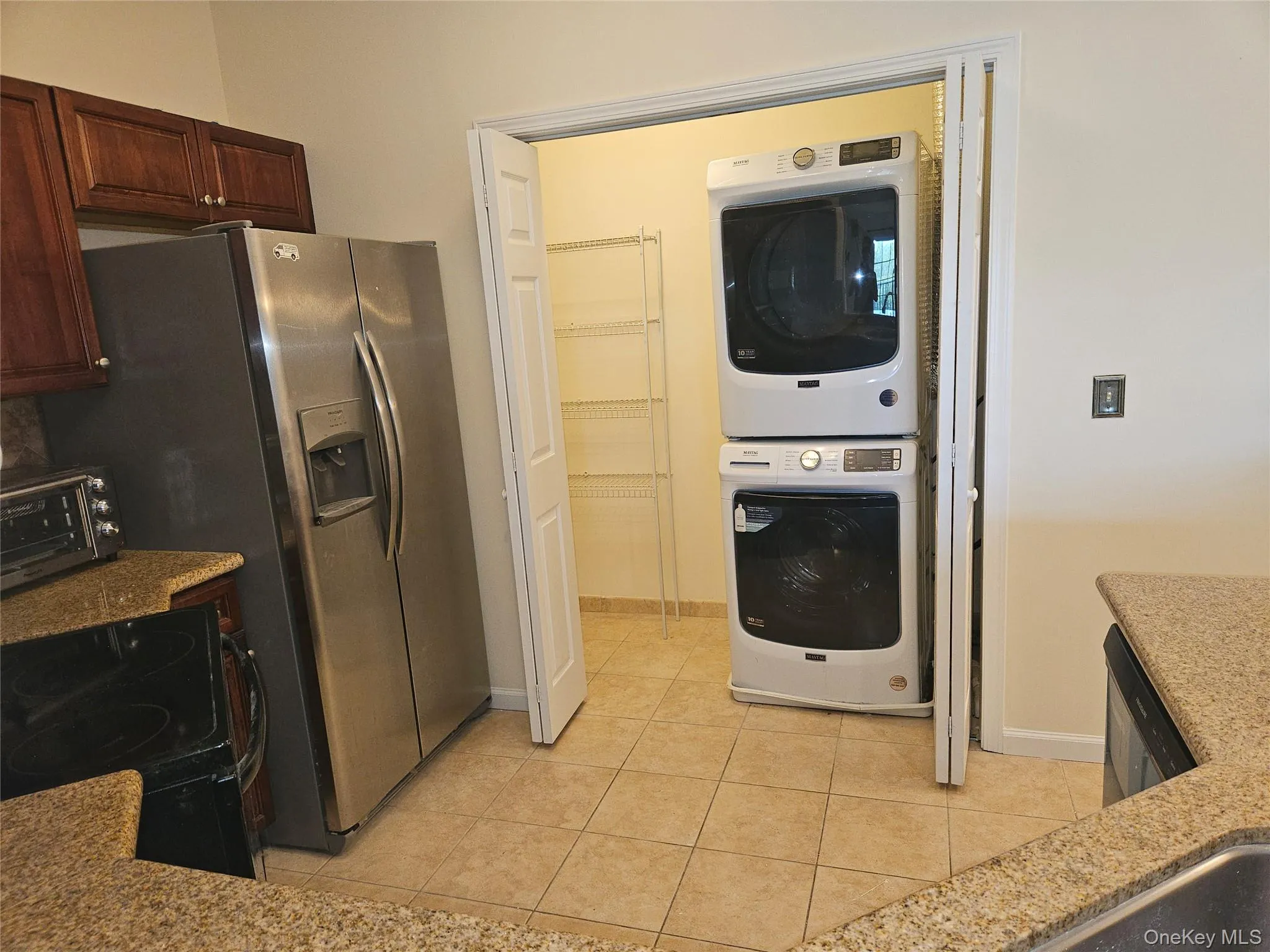 Conveniently located laundry and pantry. Conveniently located laundry and pantry.