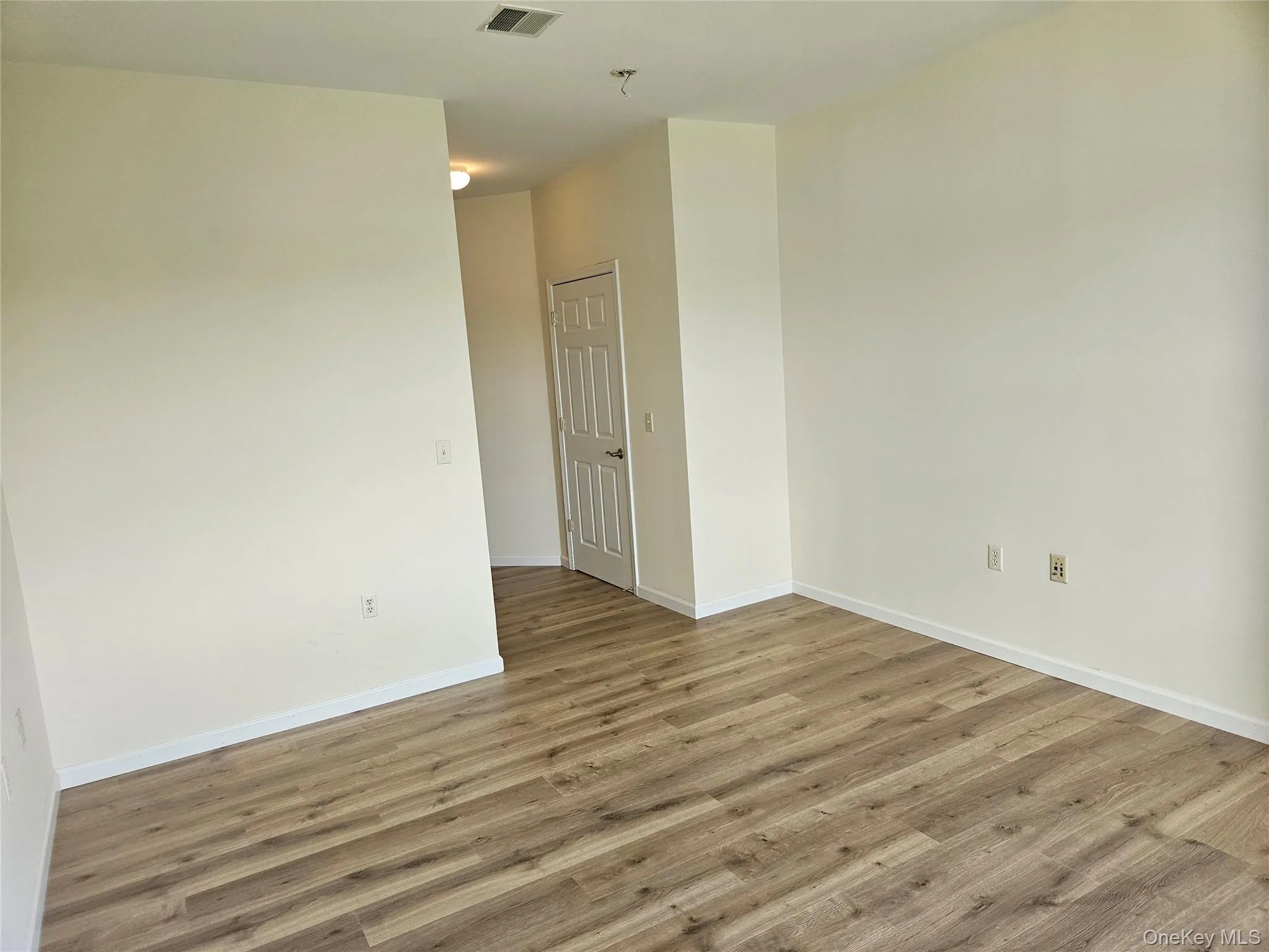 Looking toward the door to the primary bathroom. Looking toward the door to the primary bathroom.