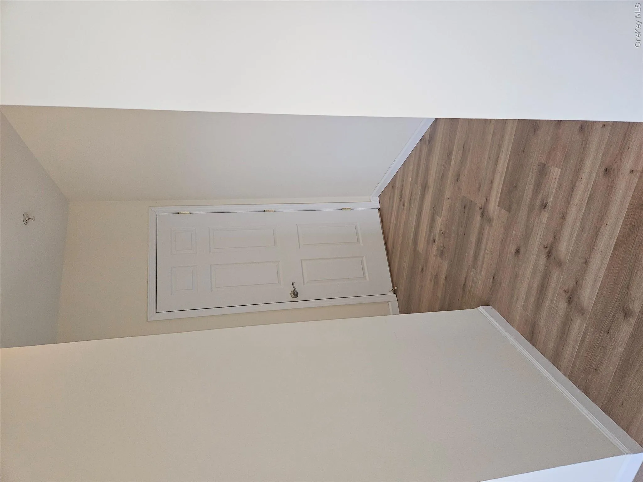 The primary bathroom is straight ahead, walk-in closet on the left (not seen) and living room on the right (not seen). The primary bathroom is straight ahead, walk-in closet on the left (not seen) and living room on the right (not seen).