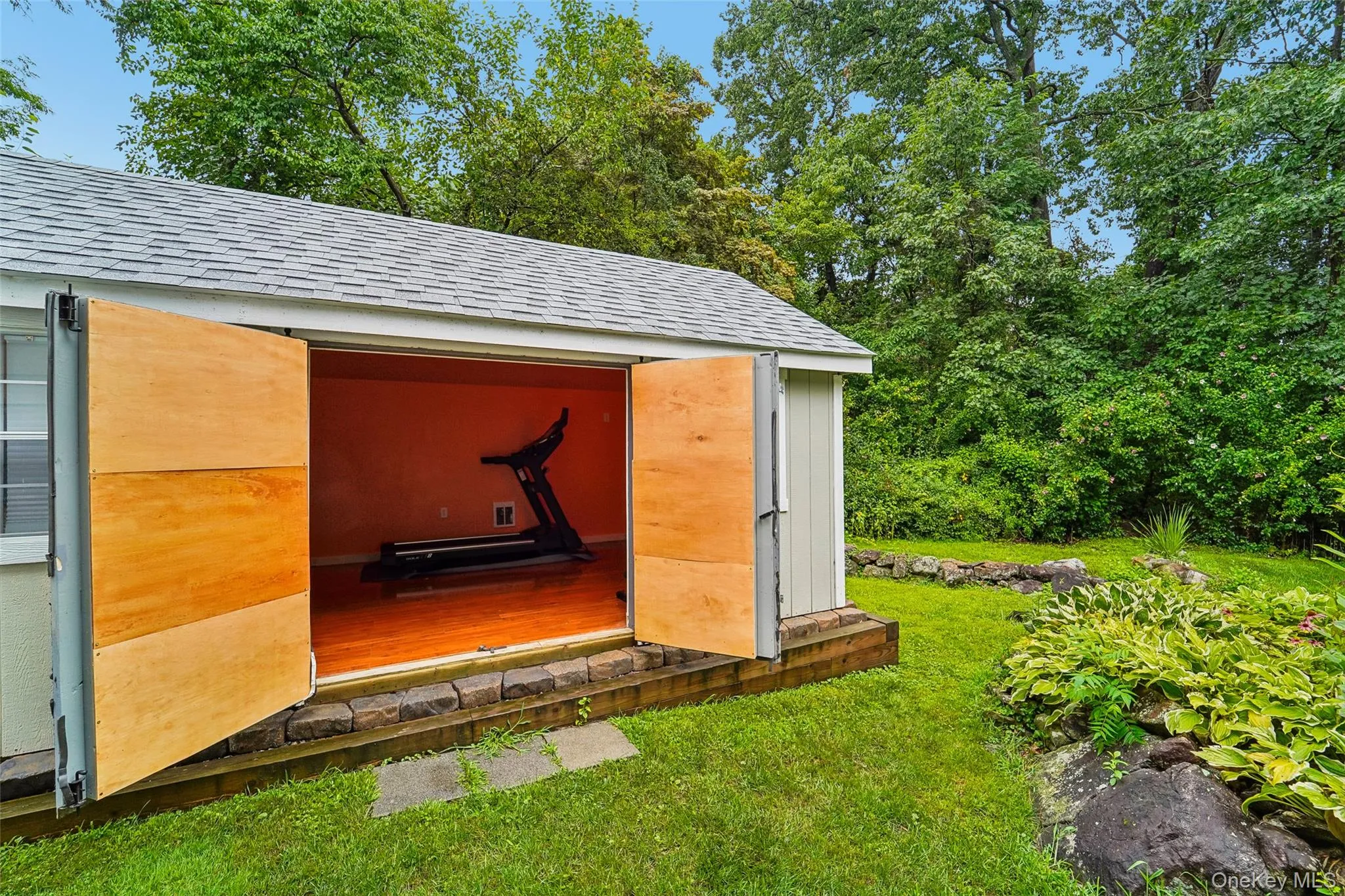 Finished shed (currently configured as a home gym.) Finished shed (currently configured as a home gym.)