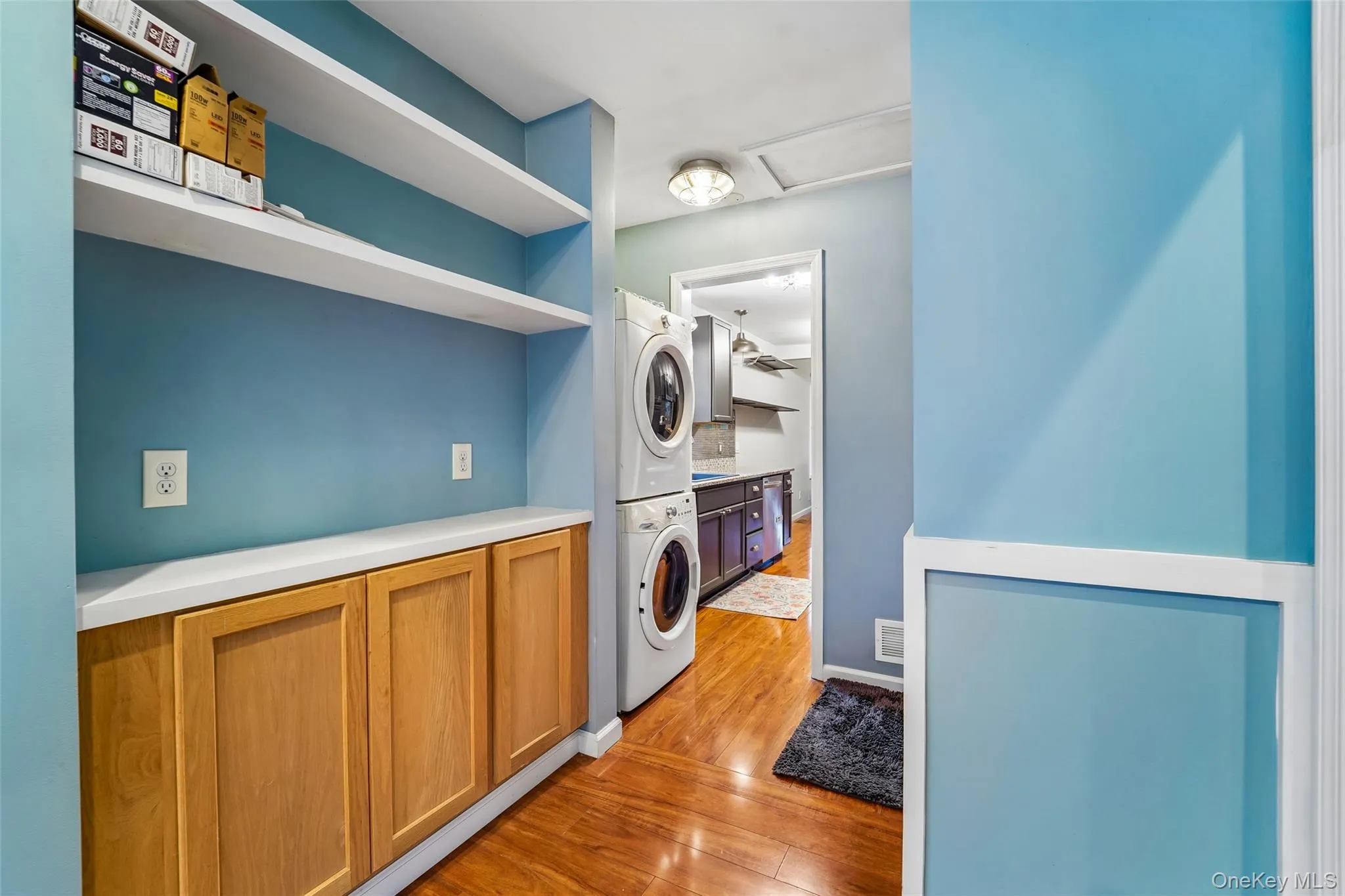 Stacked laundry area. Stacked laundry area.