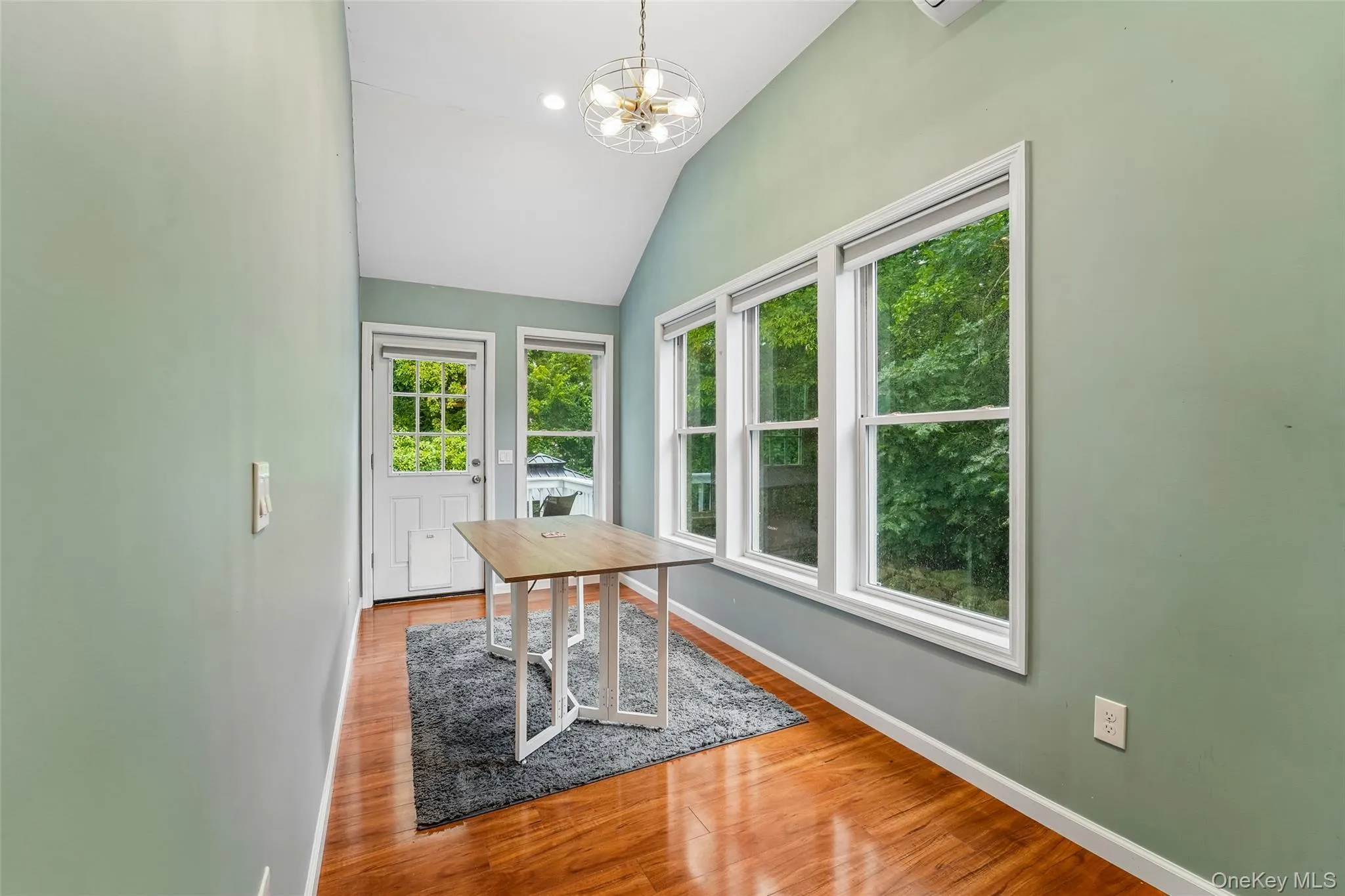 Dining area with access to rear of home. Dining area with access to rear of home.