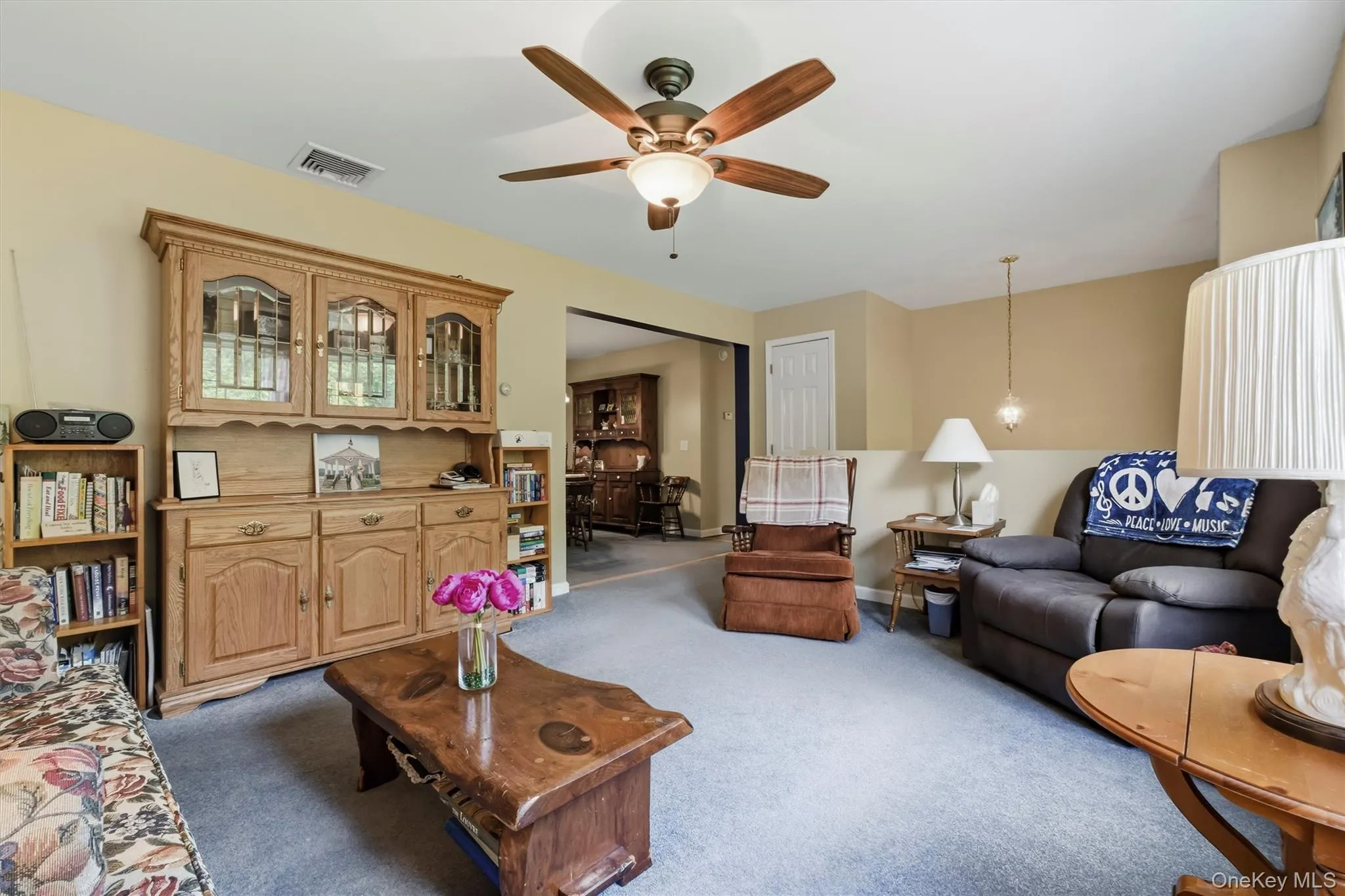 The living room flows directly into the dining room for an open concept feel The living room flows directly into the dining room for an open concept feel