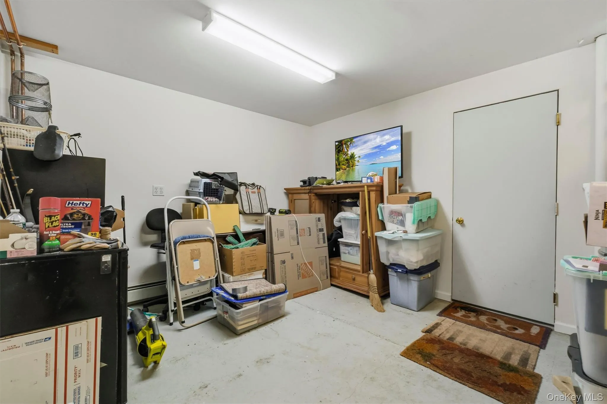 This is the oversized additional room for storage just inside the garage This is the oversized additional room for storage just inside the garage