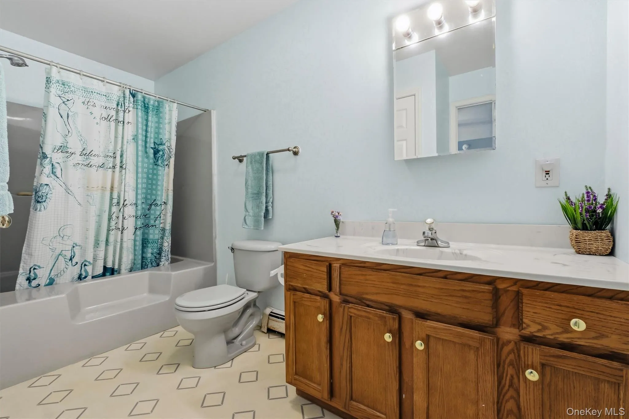 Easy step in tub and oversized vanity for all your necessities. Easy step in tub and oversized vanity for all your necessities.