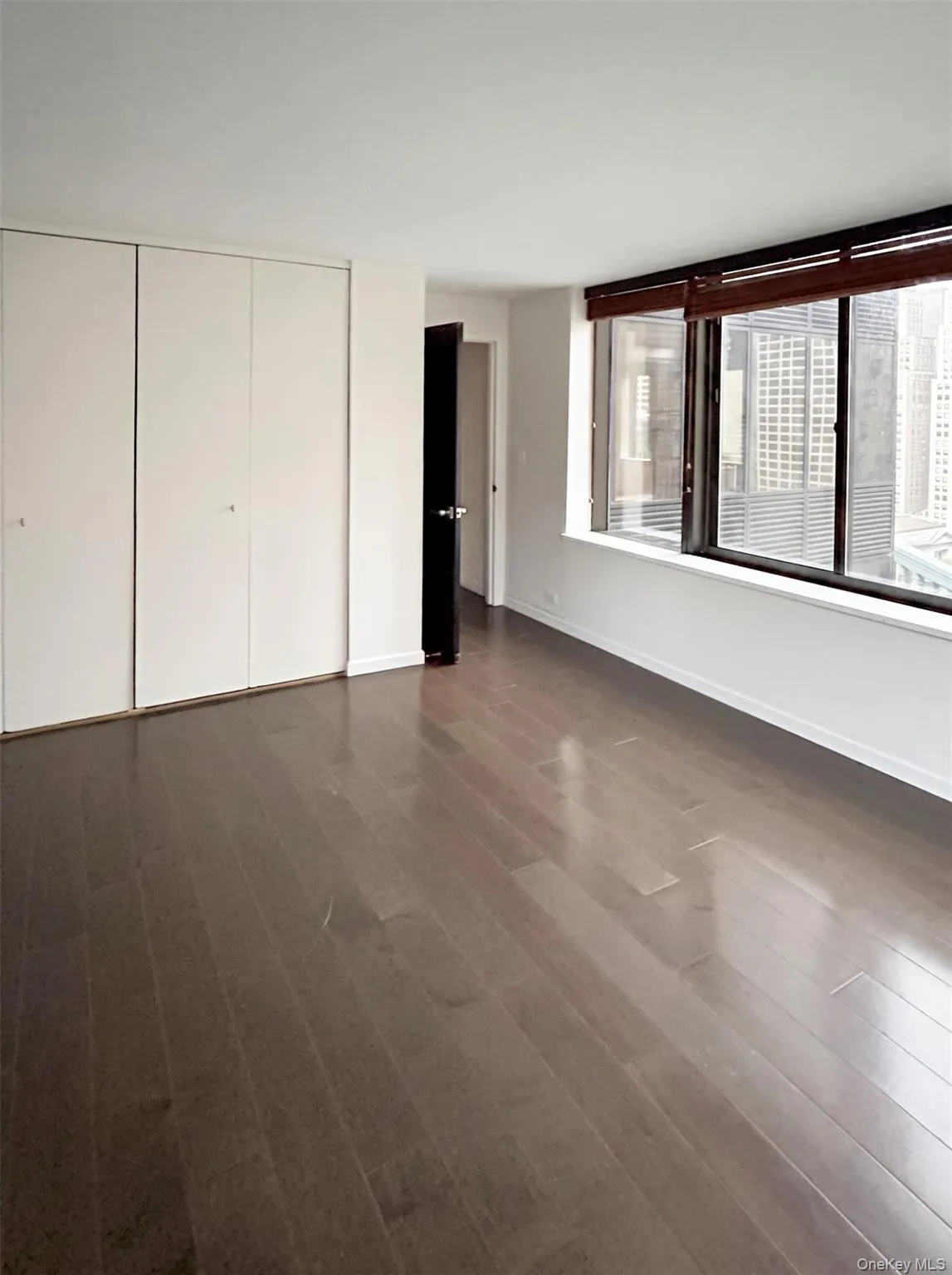 Large bedroom with built in shelves Large bedroom with built in shelves