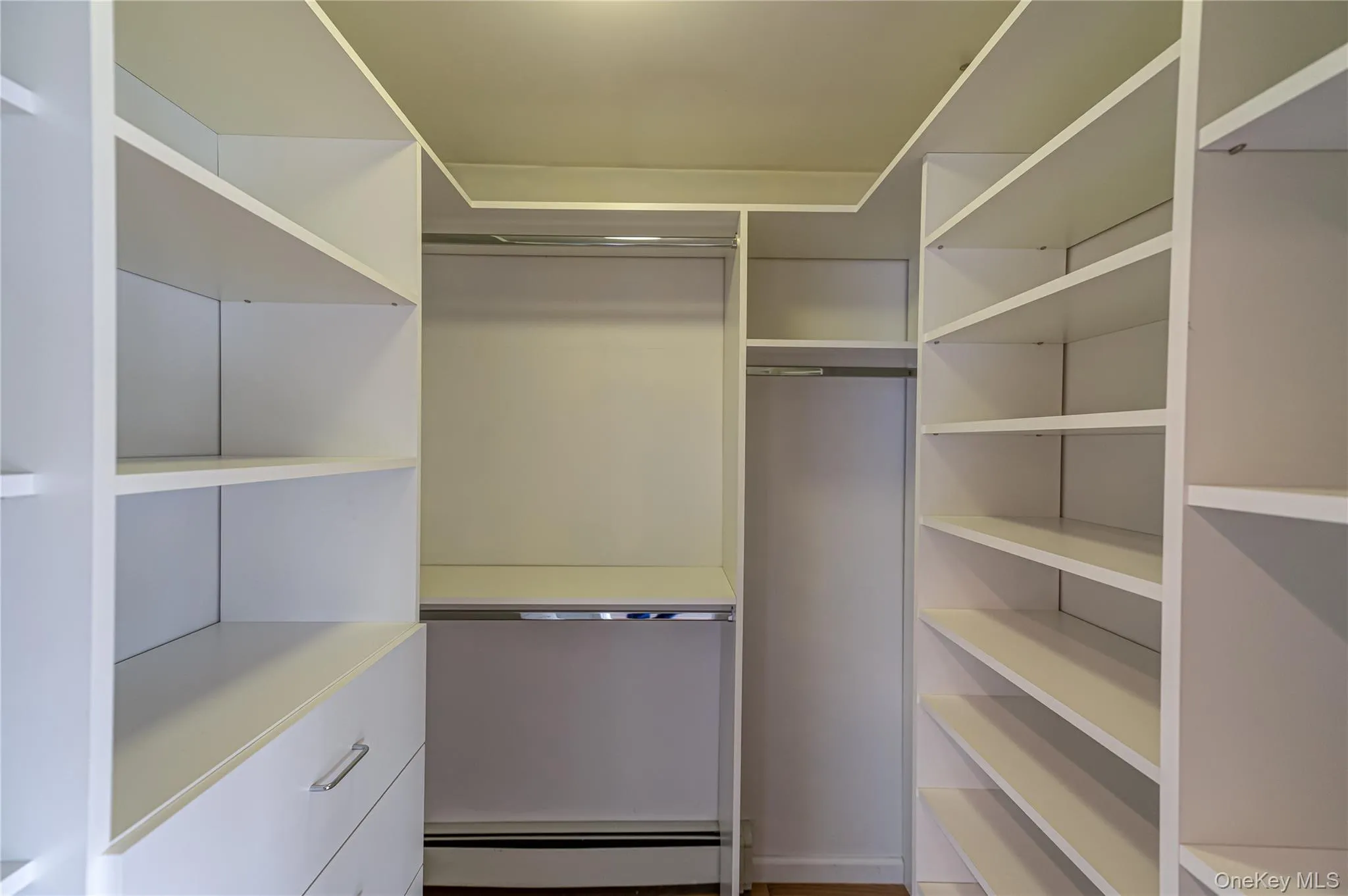 Primary Walk-in Closet Primary Walk-in Closet