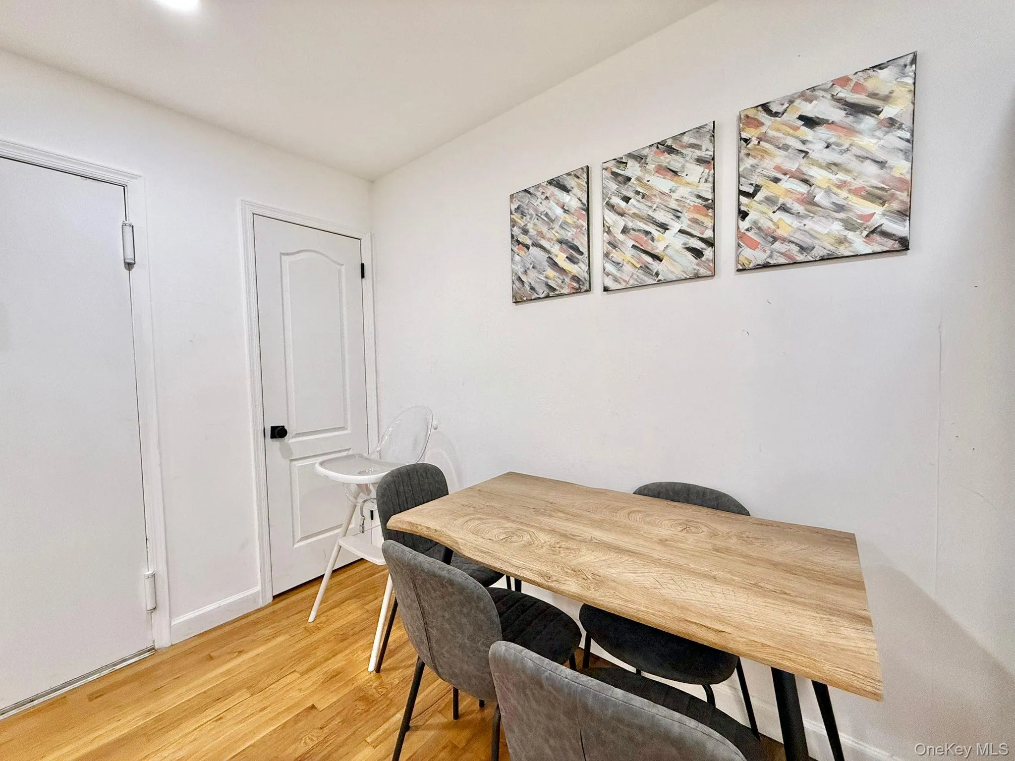 Wood-finish flooring complementing white walls Wood-finish flooring complementing white walls