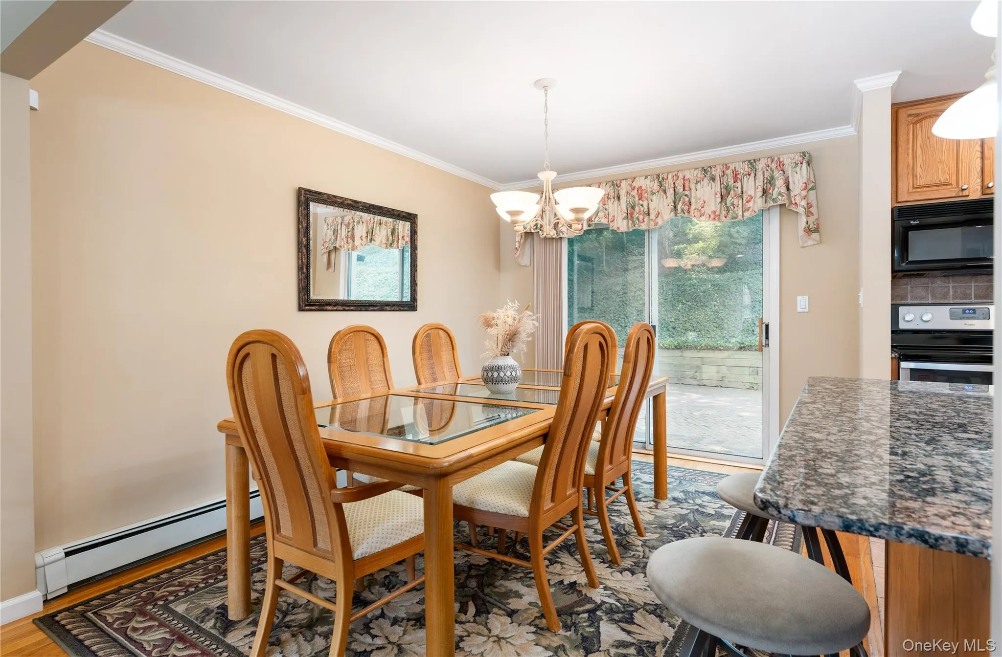 Dining room with sliding door to brick patio Dining room with sliding door to brick patio