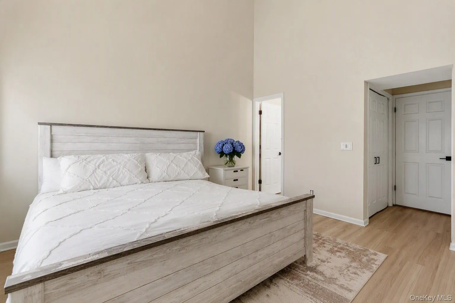 Primary bedroom with en suite bathroom Primary bedroom with en suite bathroom