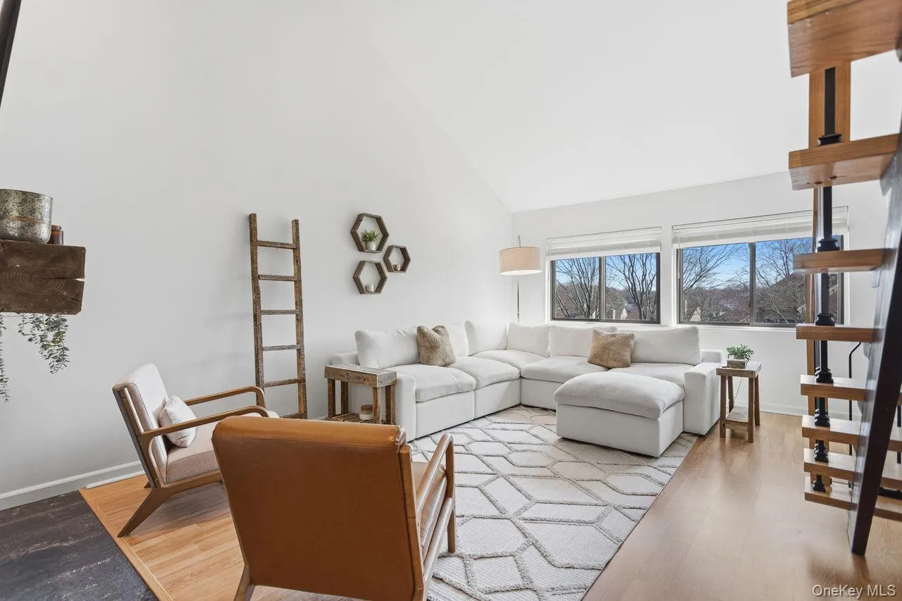 Living room with cathedral ceilings. Living room with cathedral ceilings.