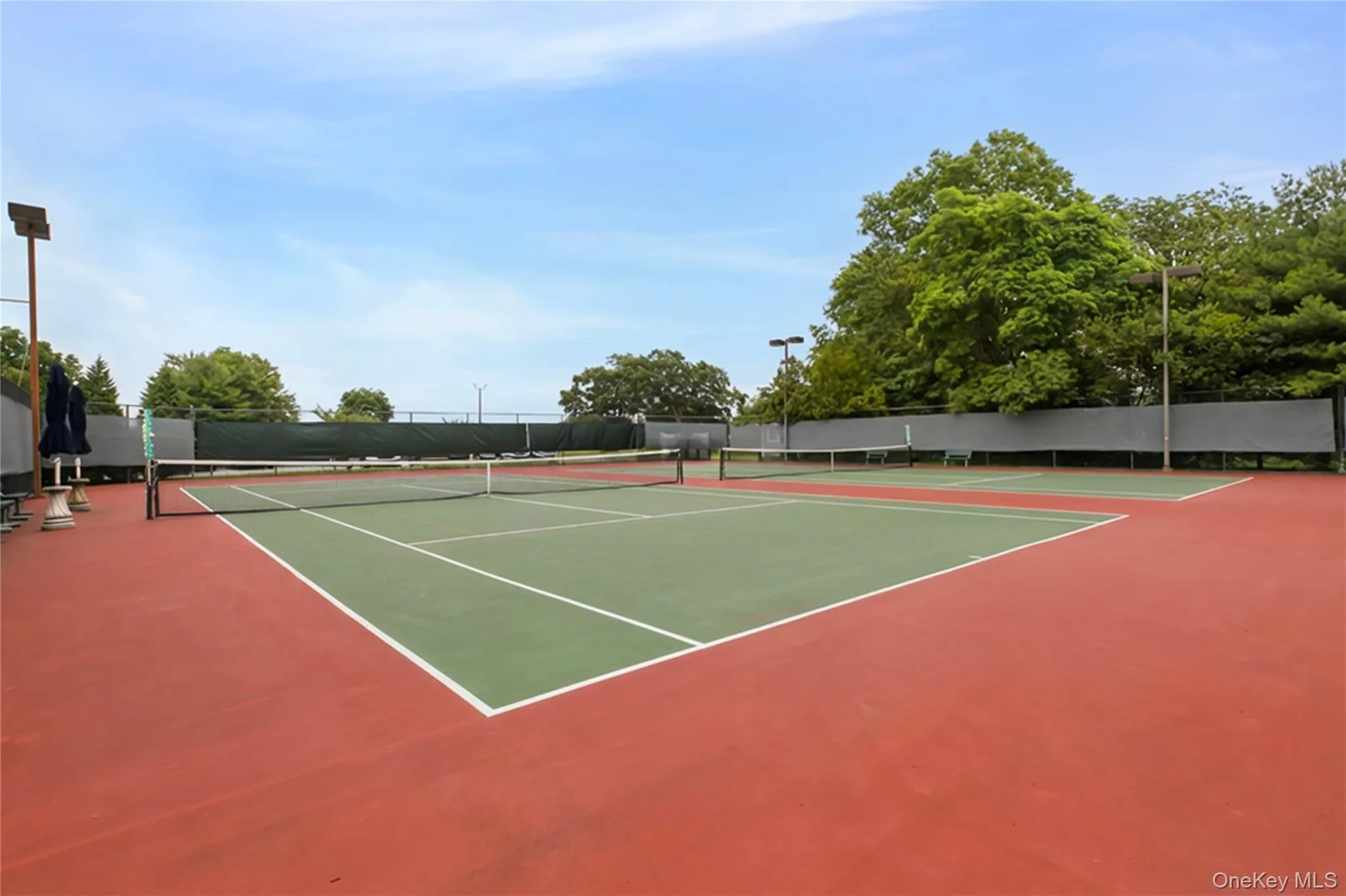 Clubhouse tennis courts Clubhouse tennis courts
