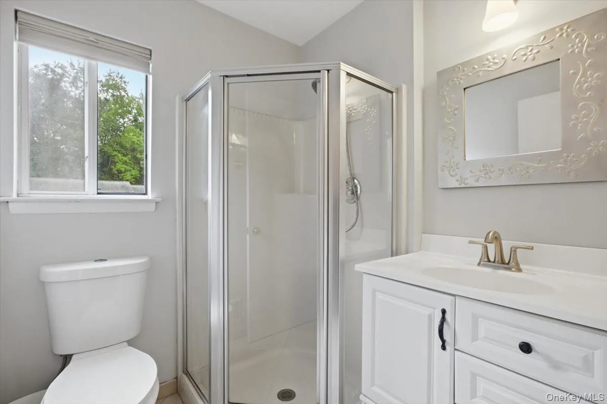 Hall Full Bath w. White Cabinets and Shower Hall Full Bath w. White Cabinets and Shower