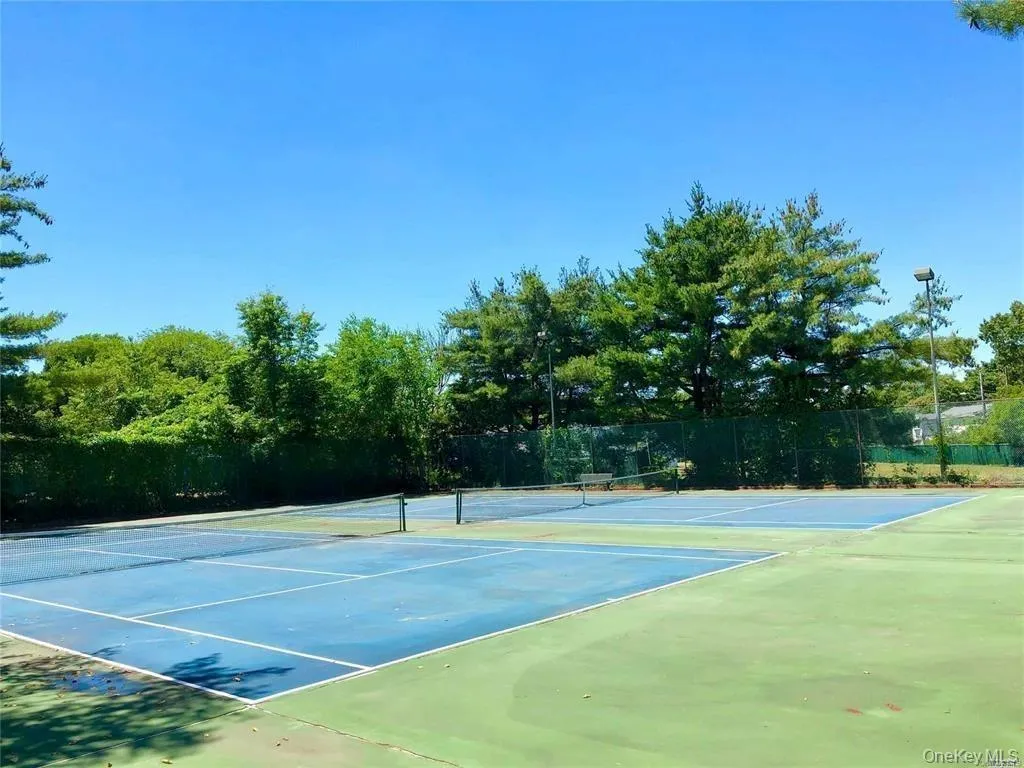 View of tennis court View of tennis court