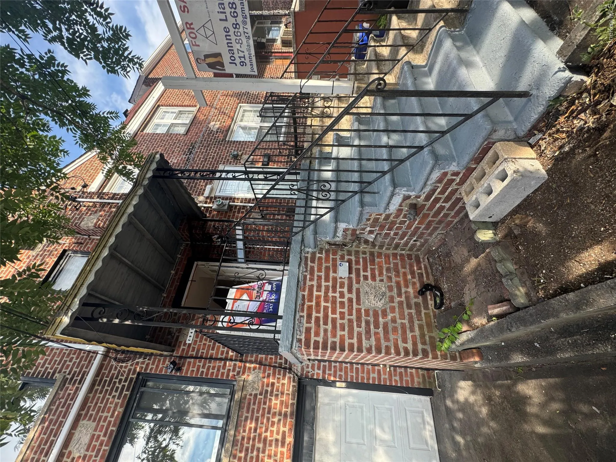 Brick facade with a covered entry Brick facade with a covered entry