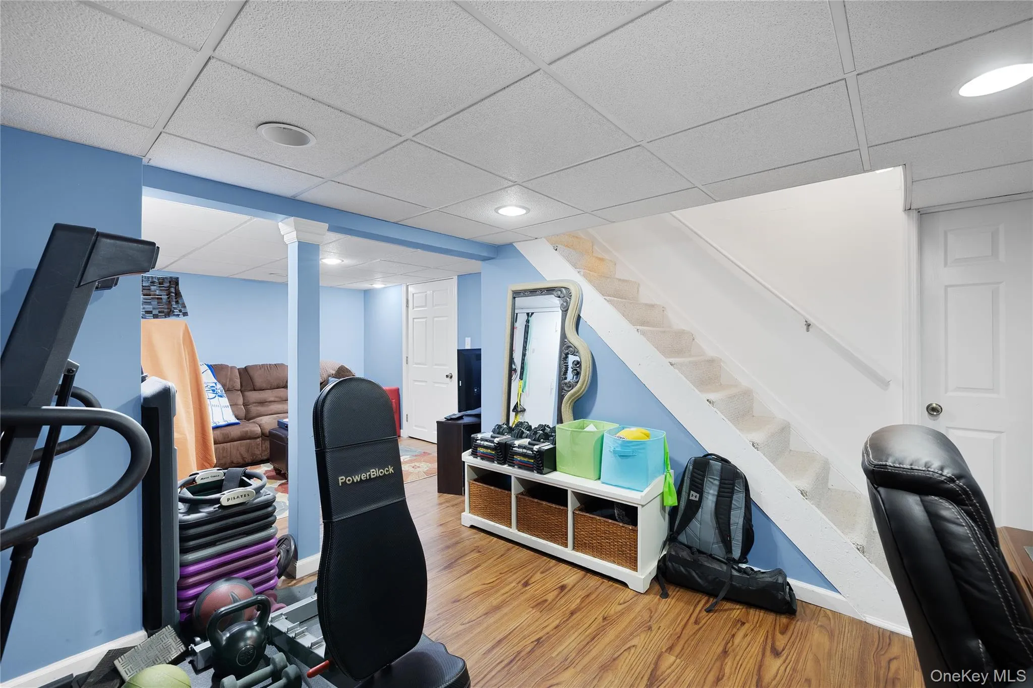 Partially finished basement, carpeted staircase, existing handrail, recessed lighting. Partially finished basement, carpeted staircase, existing handrail, recessed lighting.