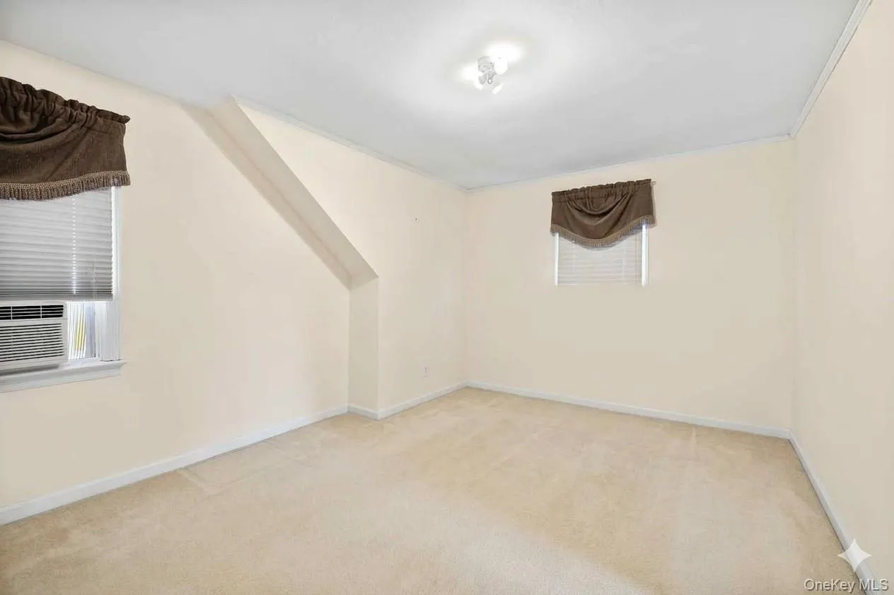 AI edited to remove all furniture in primary bedroom. AI edited to remove all furniture in primary bedroom.
