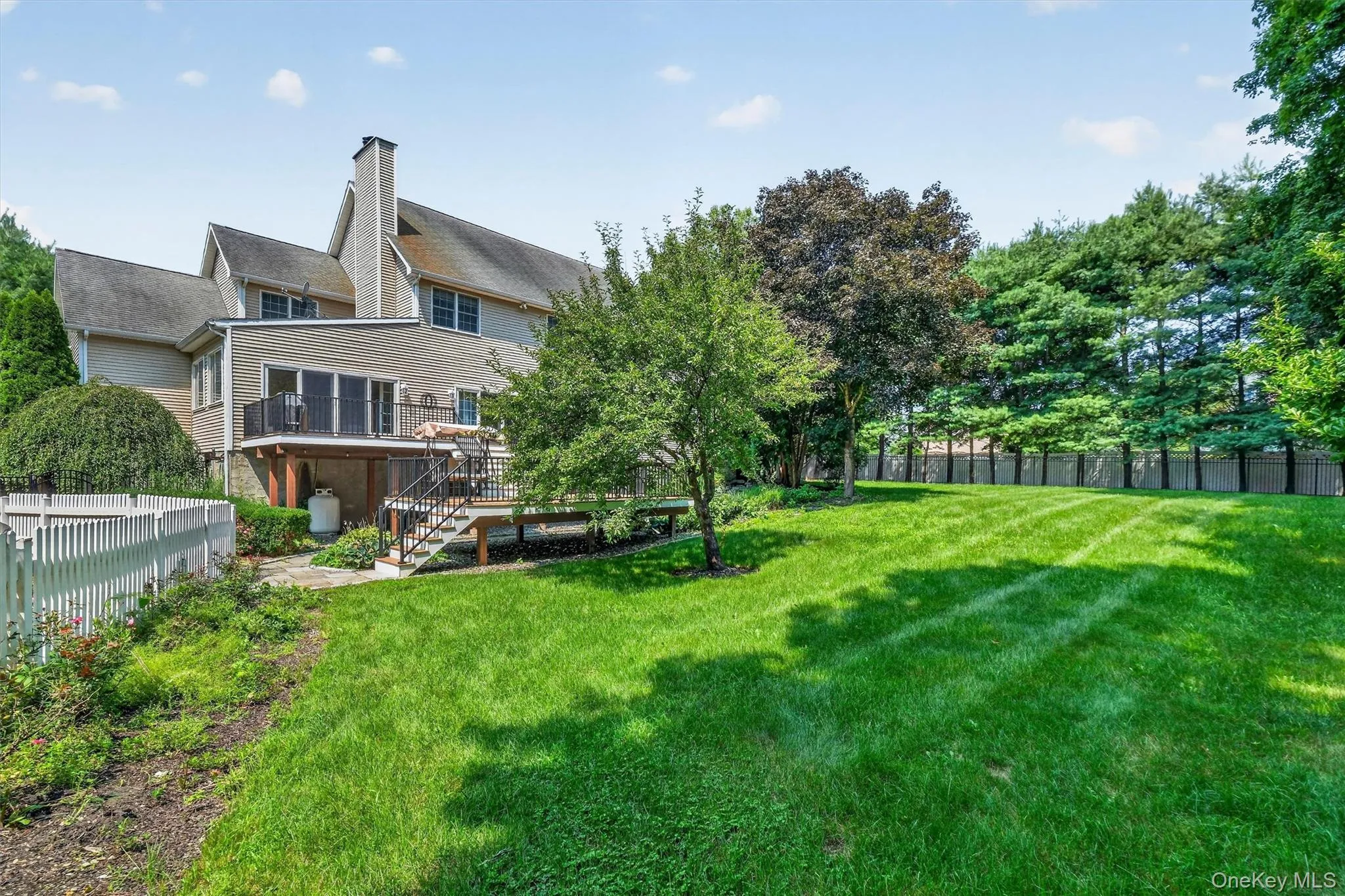 A beautifully manicured, fenced-in backyard completes this exceptional property. A beautifully manicured, fenced-in backyard completes this exceptional property.